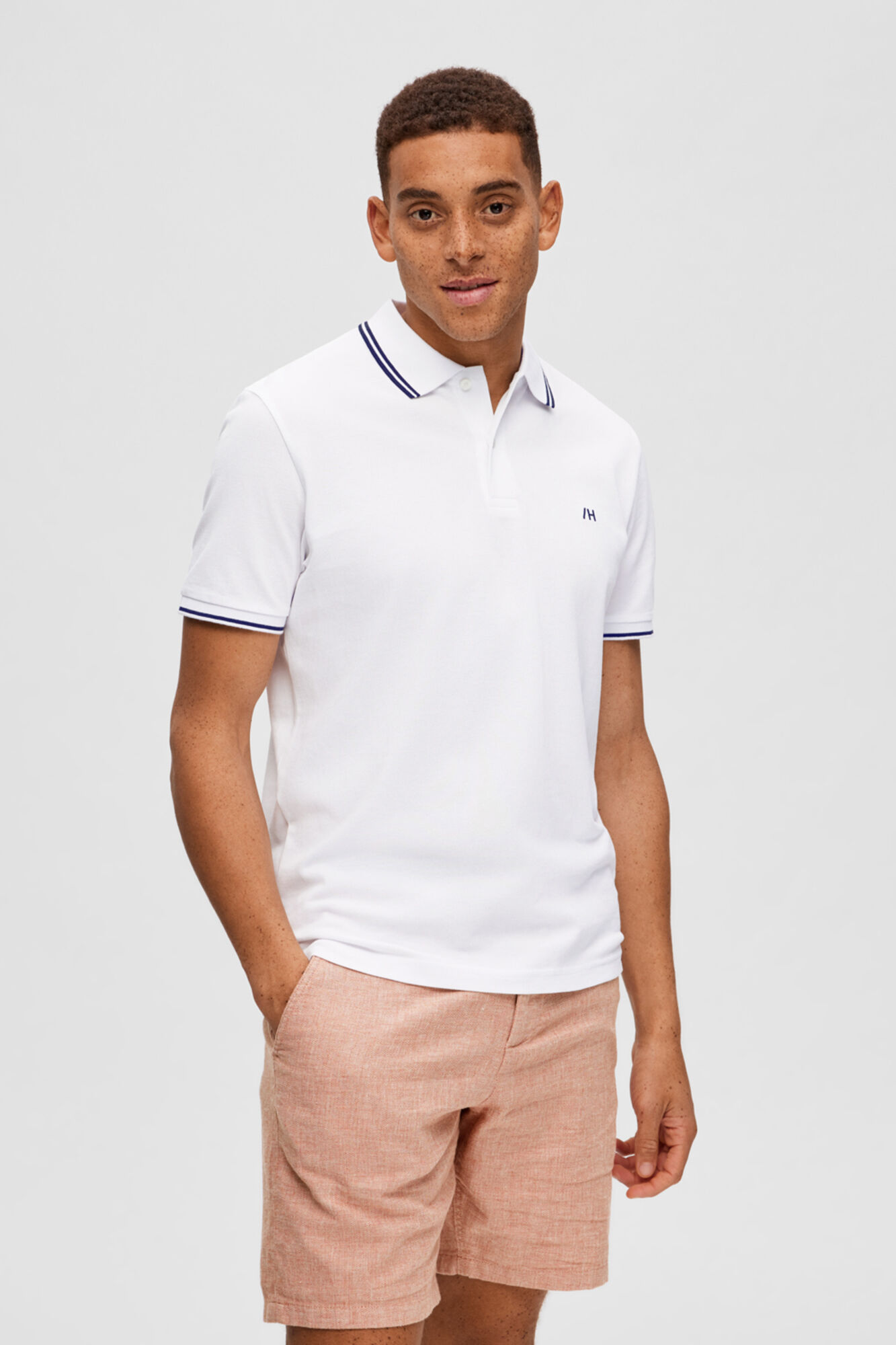 Camisa polo 100% algodão orgânico com logotipo bordado - Branca