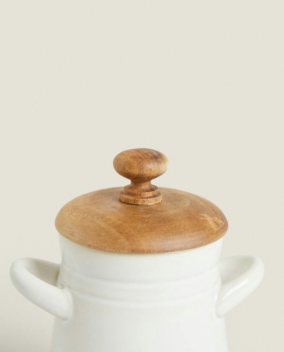 Pote de mel de cerâmica com tampa de madeira