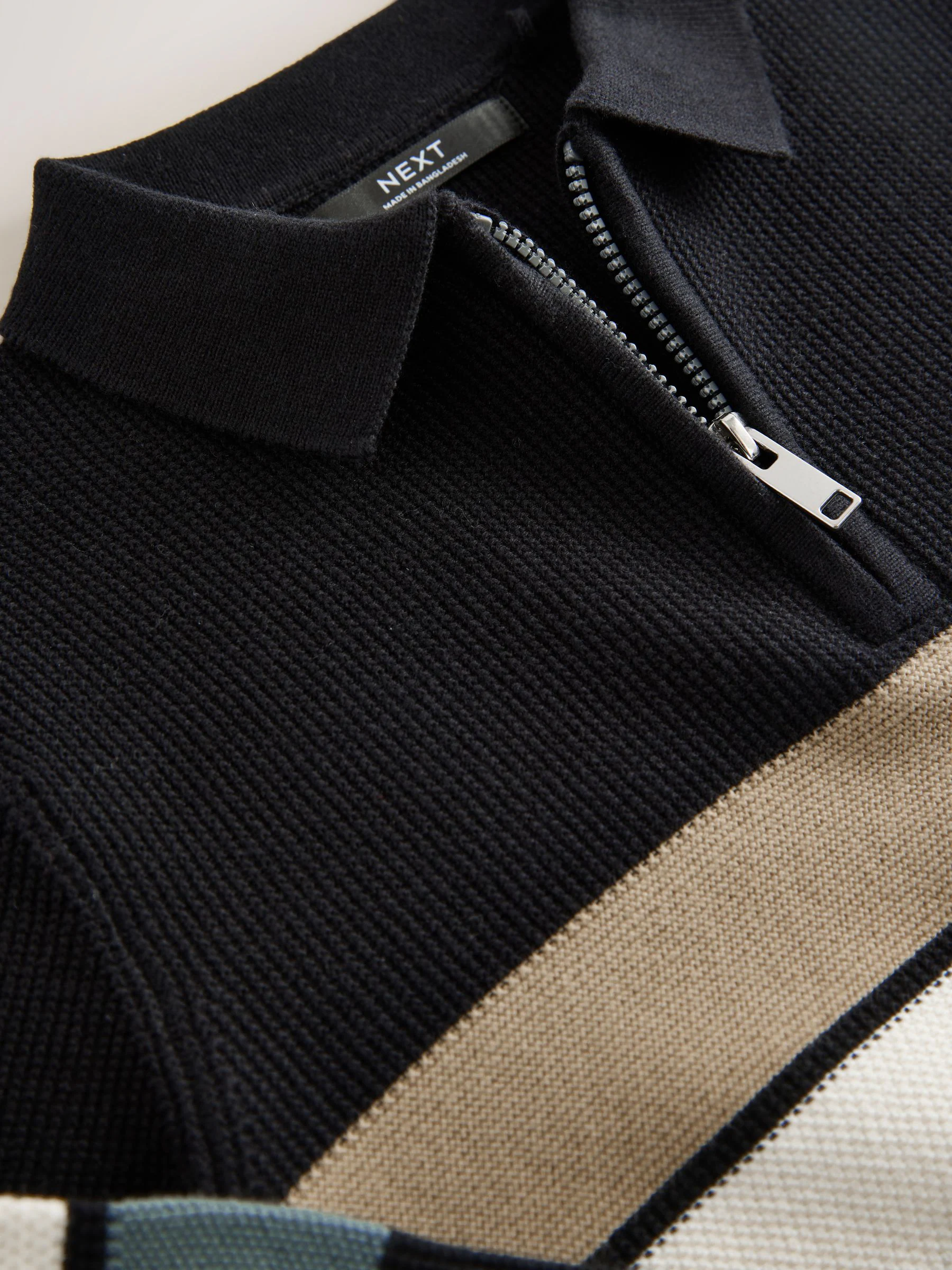 Zwarte streep - Gebreid poloshirt met rits bij de hals en lange mouwen (3-16jr)