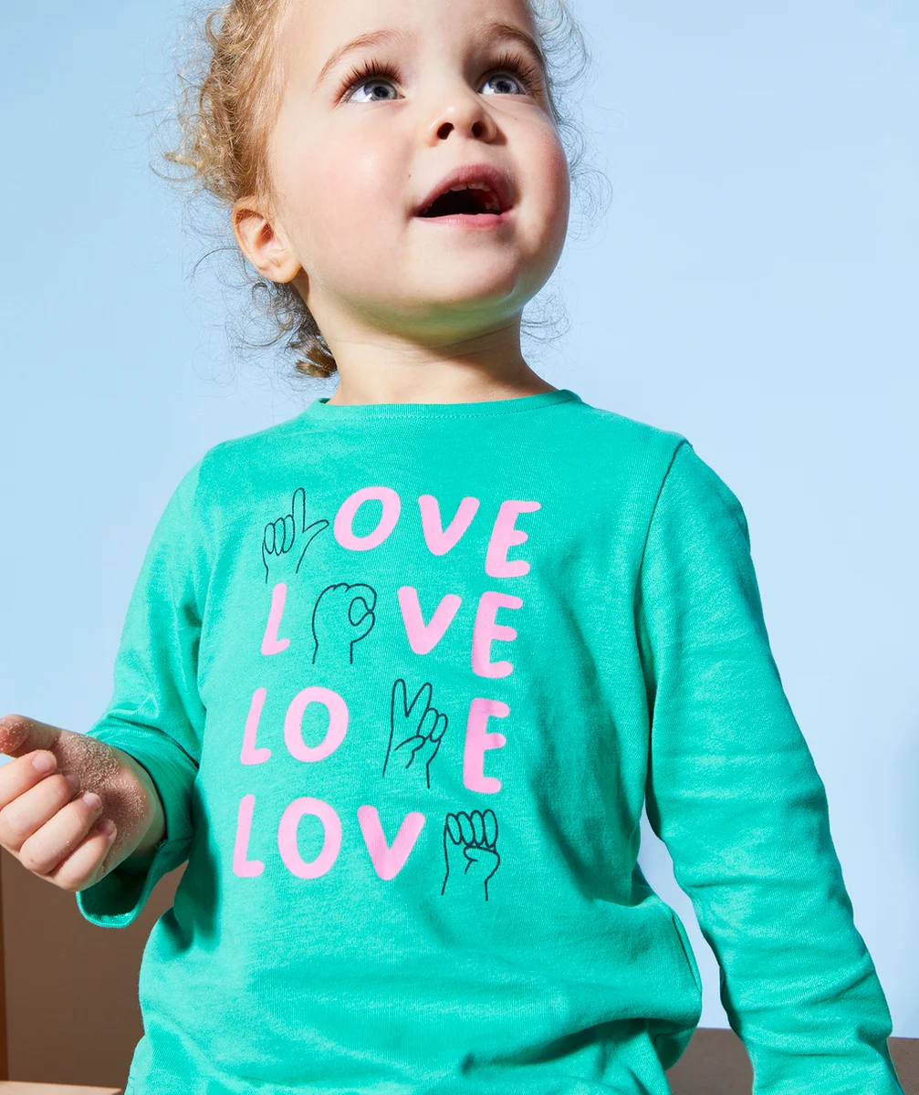 T-SHIRT BÉBÉ FILLE EN COTON BIO VERT ET MESSAGE ROSE