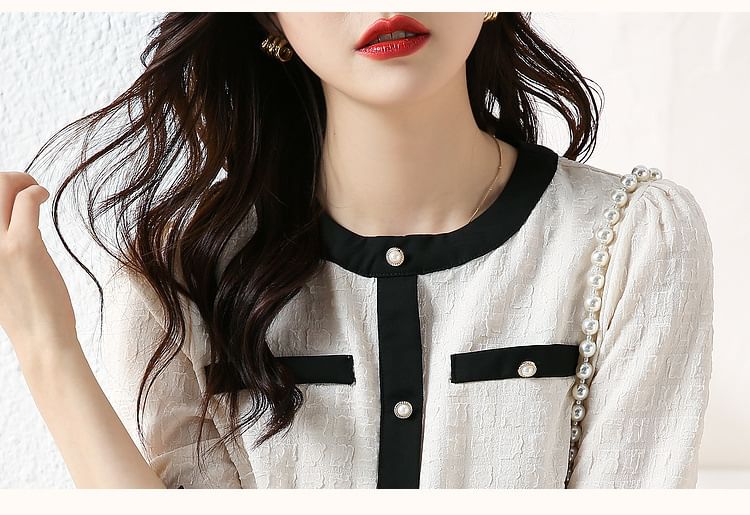 Daybreak - Blouse met ronde hals en contrasterende bies