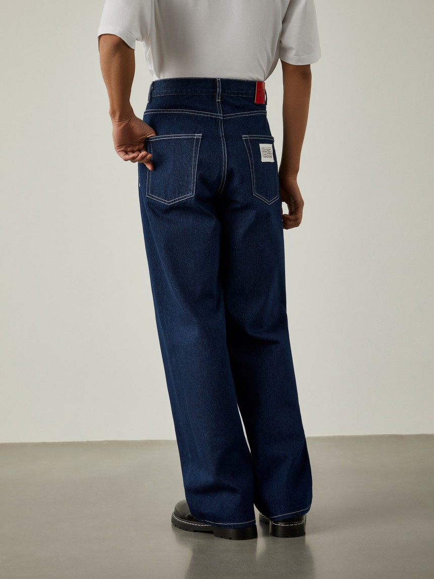 Calças denim loose fit Lion x Paatiff