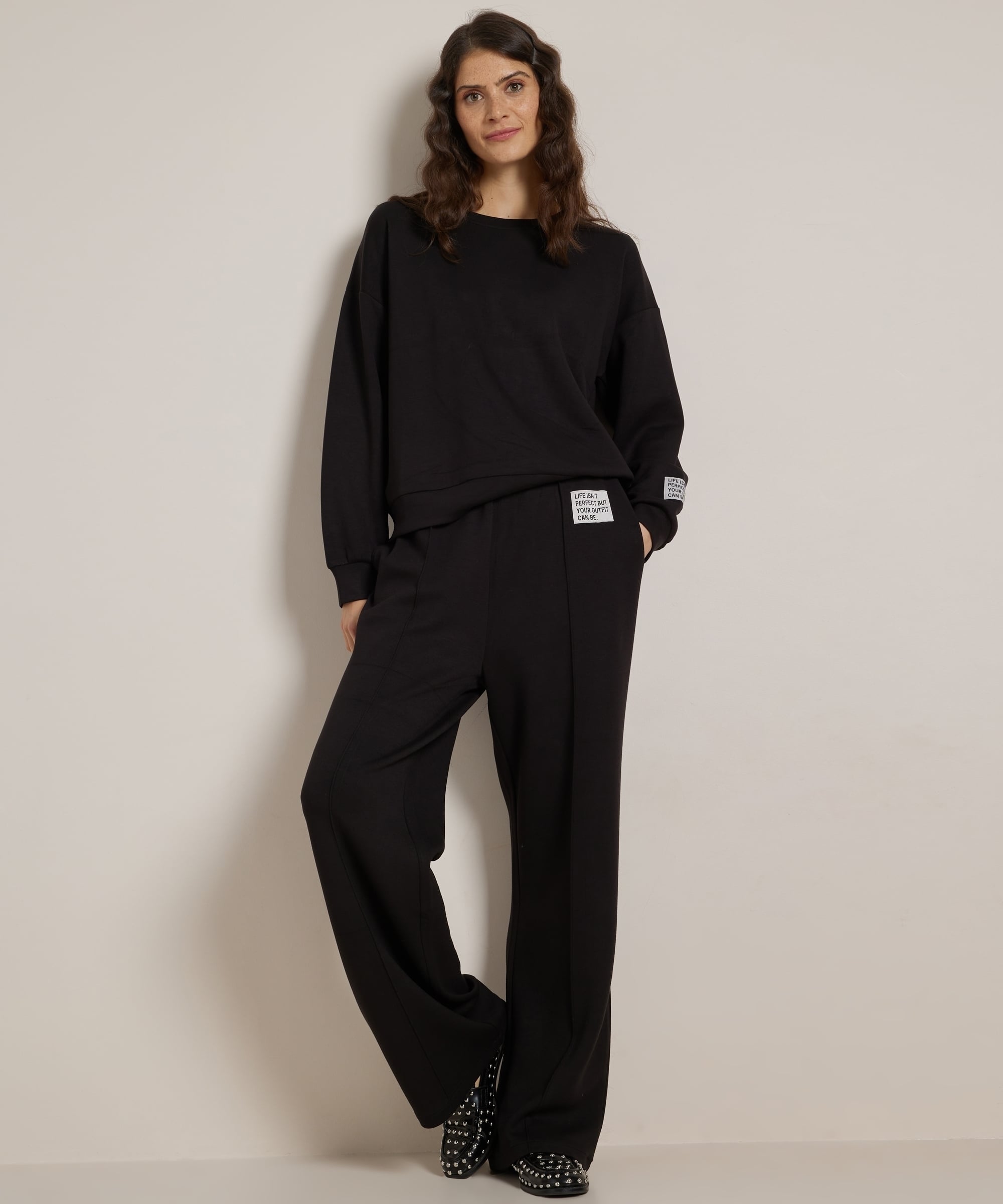 trui met mouwlabel