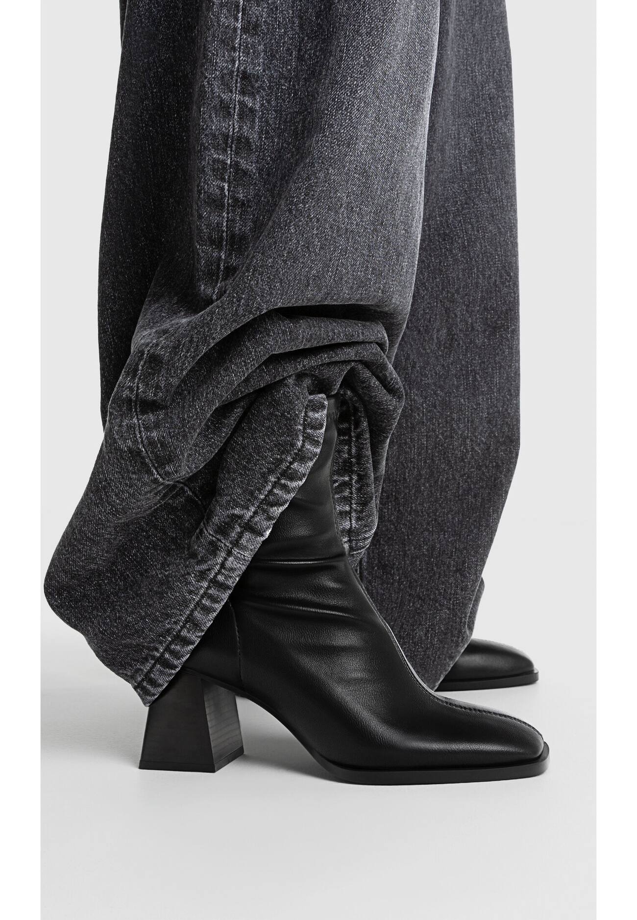 Botas de salto médio com pernas elásticas