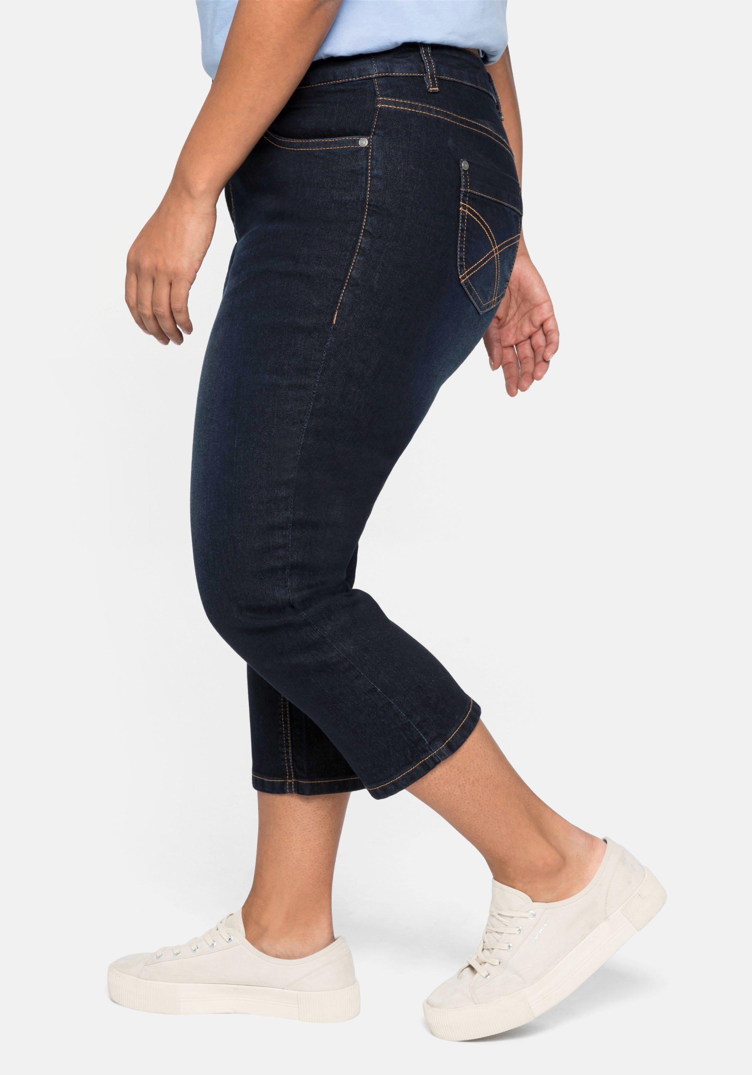 Caprijeans mit Kontrastnähten und Catfaces