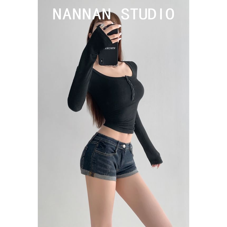 Shira - Denim shorts met lage taille en opgerolde zoom