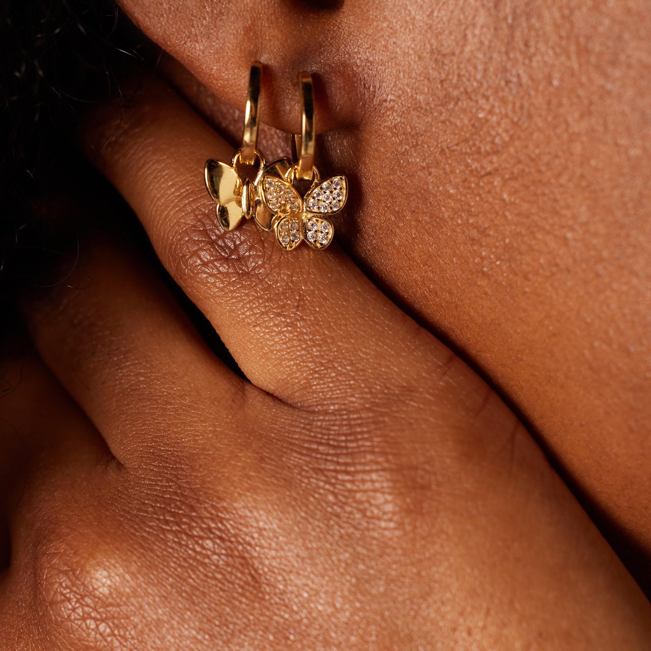 Zilveren goldplated oorringen vlinder zirkonia