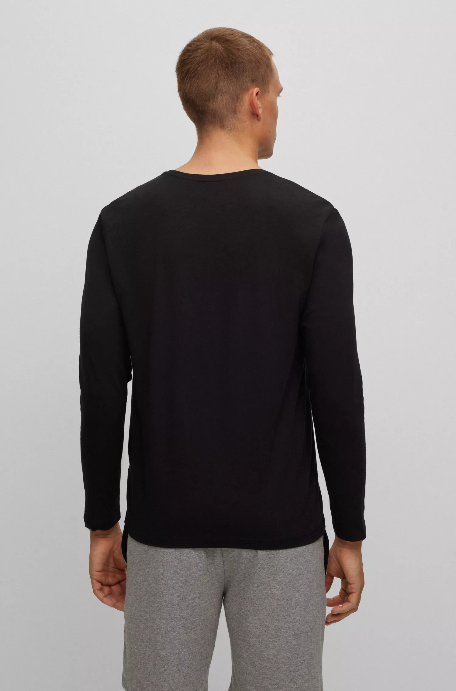 Camiseta BOSS preta de algodão stretch com modelagem regular e logotipo bordado.
