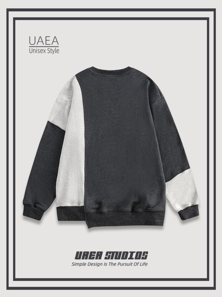 Chuoku - Asymmetrische sweatshirt met ronde hals en patchwork