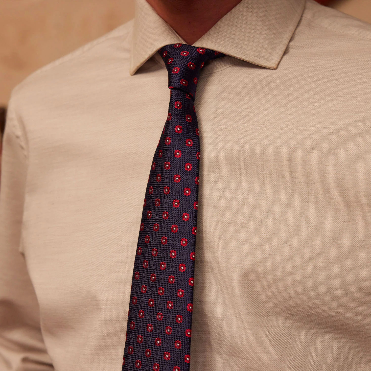 Navy tie with floral patterns