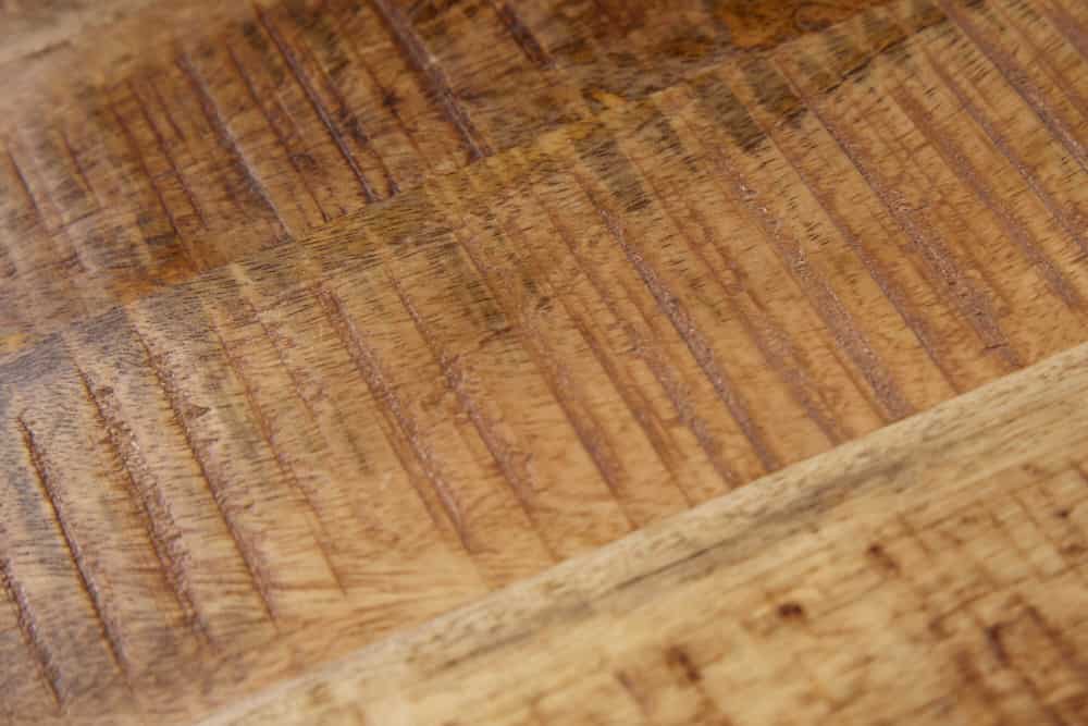 Massiver Beistelltisch FACTORY 45cm natur Mangoholz geflammt auf Rollen