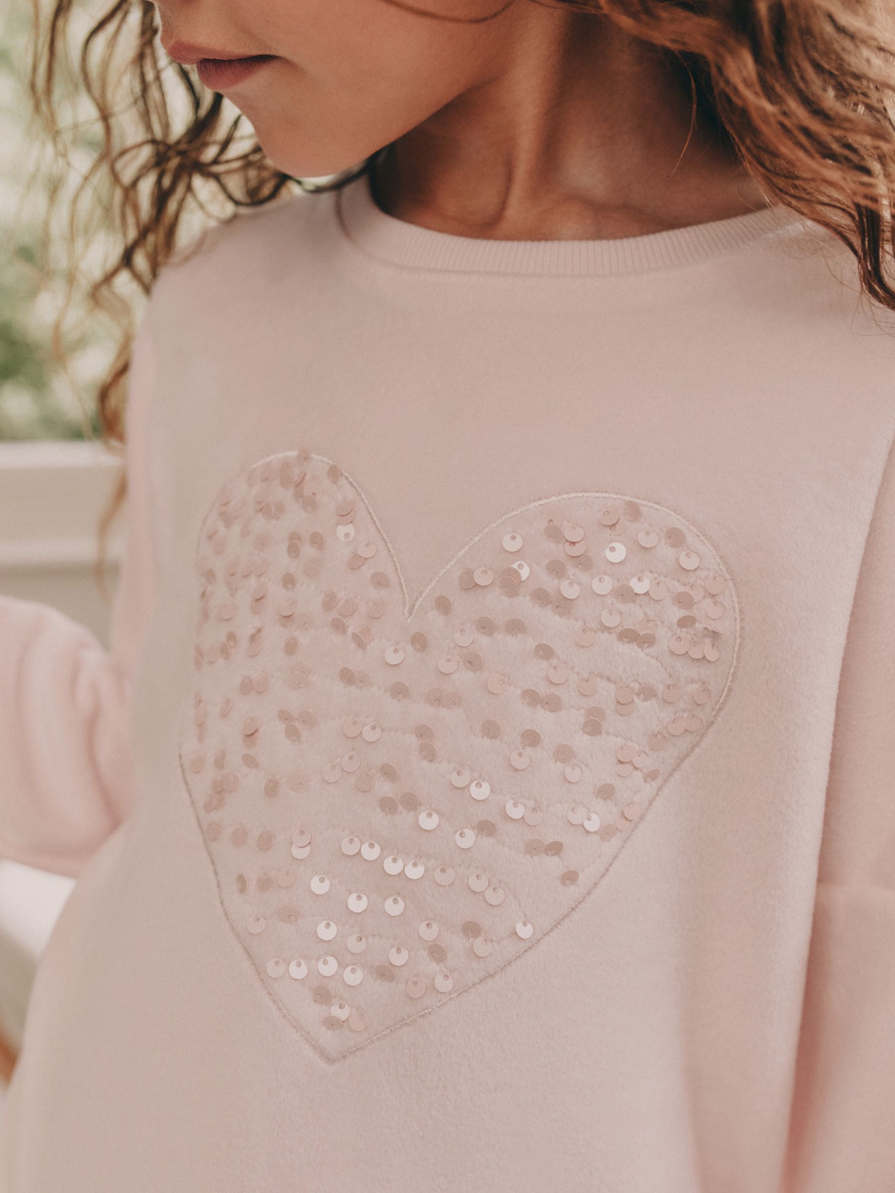 Roze met hart van lovertjes - Behaaglijke fleece pyjama (9 mnd-16 jr)