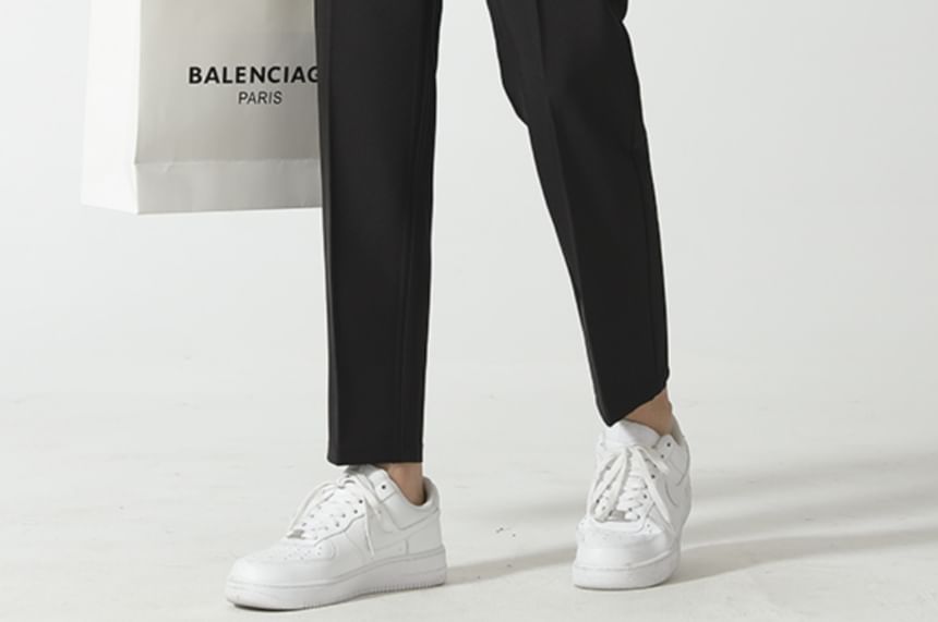 Loansk - Effen cropped, taps toelopende broek met trekkoord in de taille