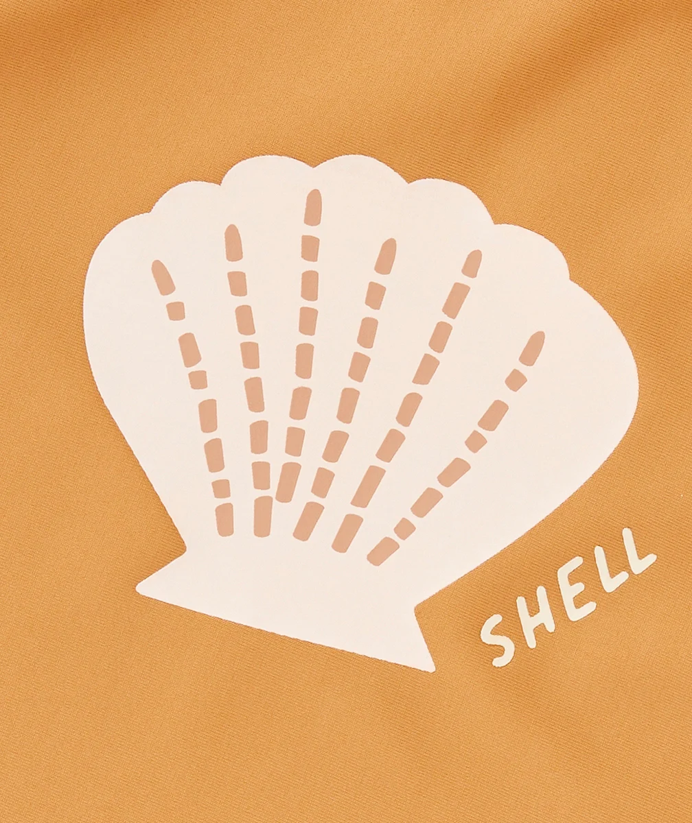 LASSIGT-SHIRT ANTI-UV BÉBÉ CARAMEL IMPRIMÉ COQUILLAGE