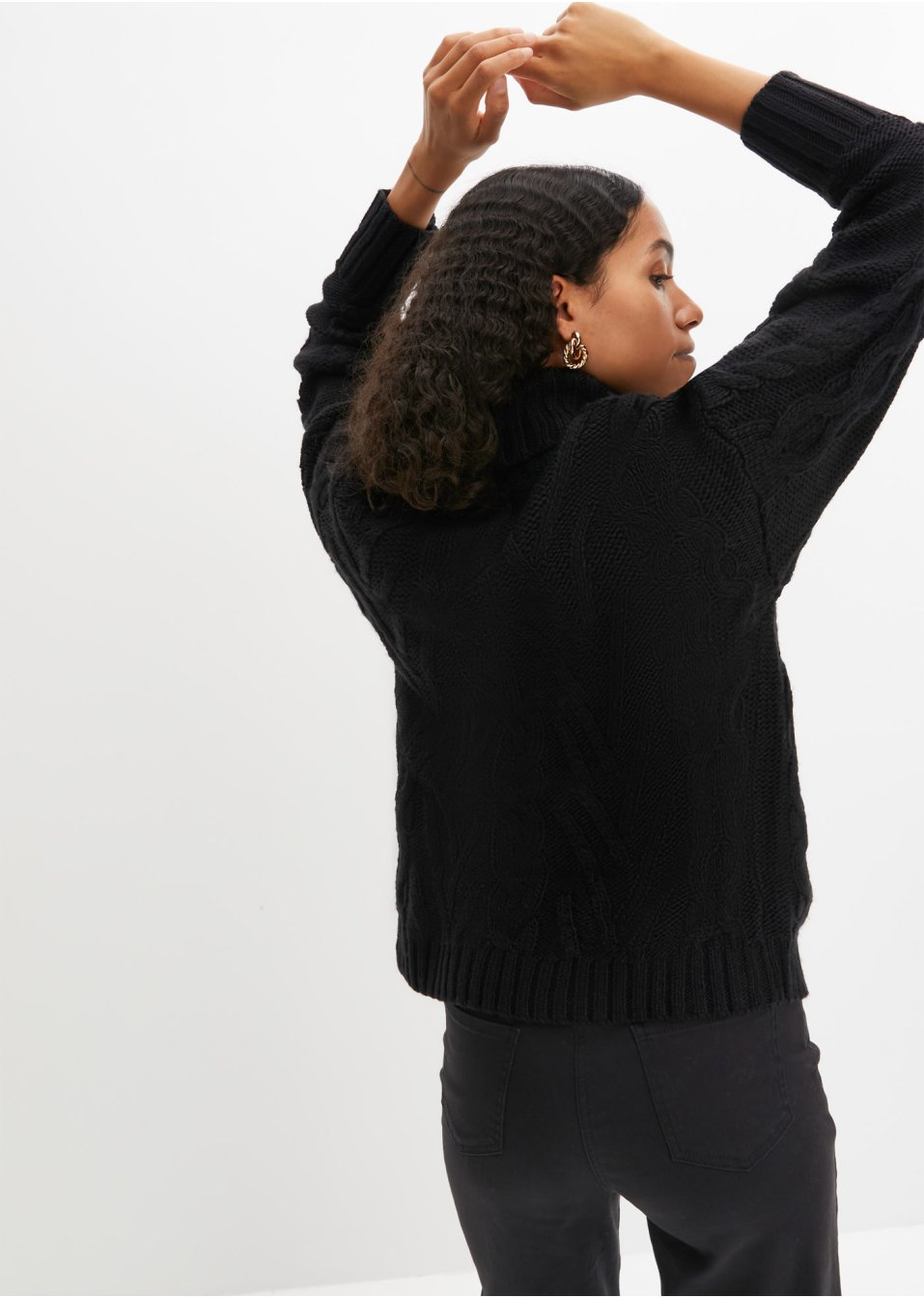 Pull à col roulé et torsades