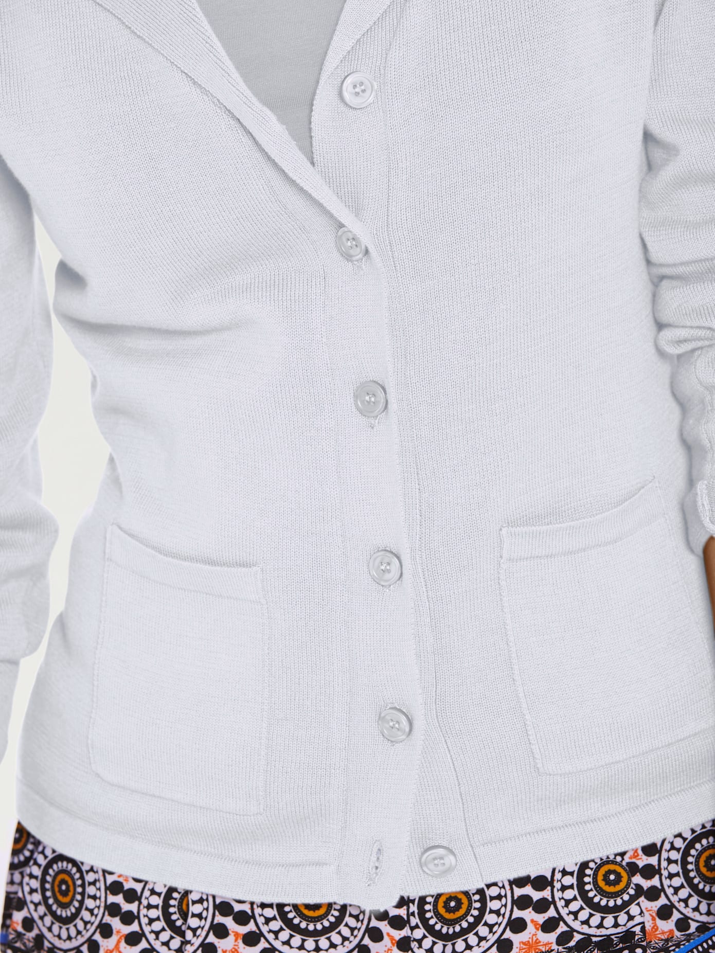 Veste en tricot fin superbe basique avec poches plaquées