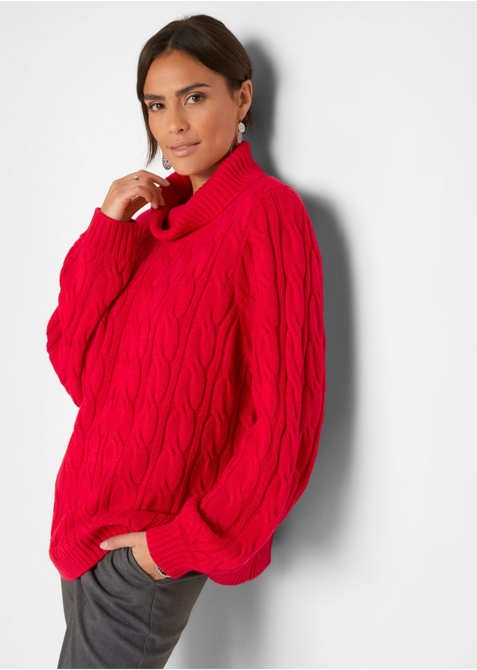 Pull col roulé à motif torsadé