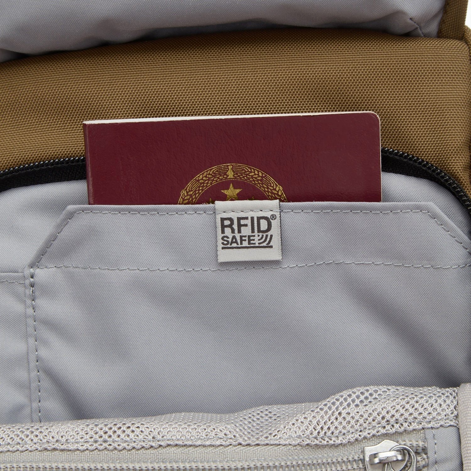 Pacsafe Metrosafe X Anti-Theft Compact Crossbody tan