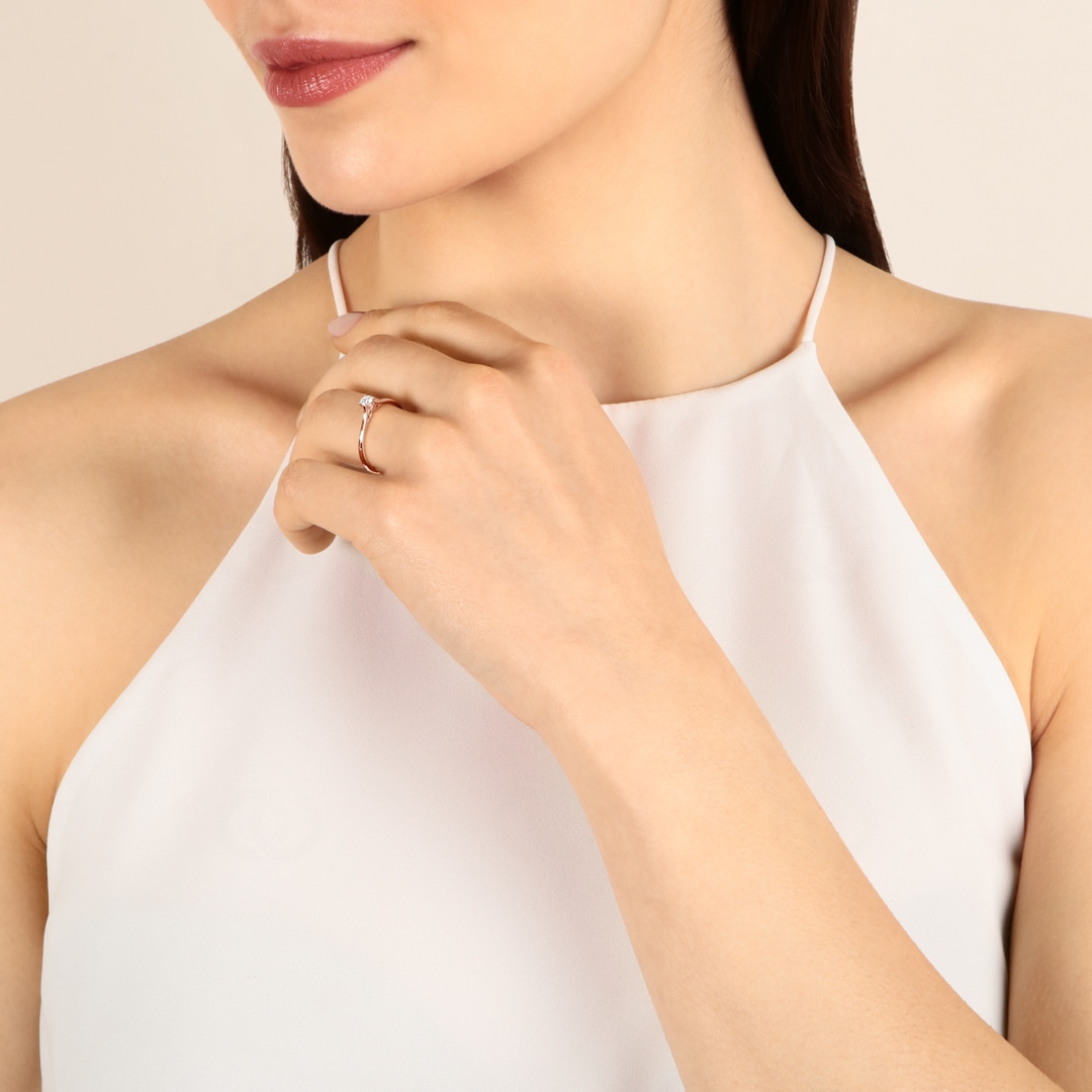 Solitärring 750/18 K Roségold mit Diamant 0.12ct H/Si