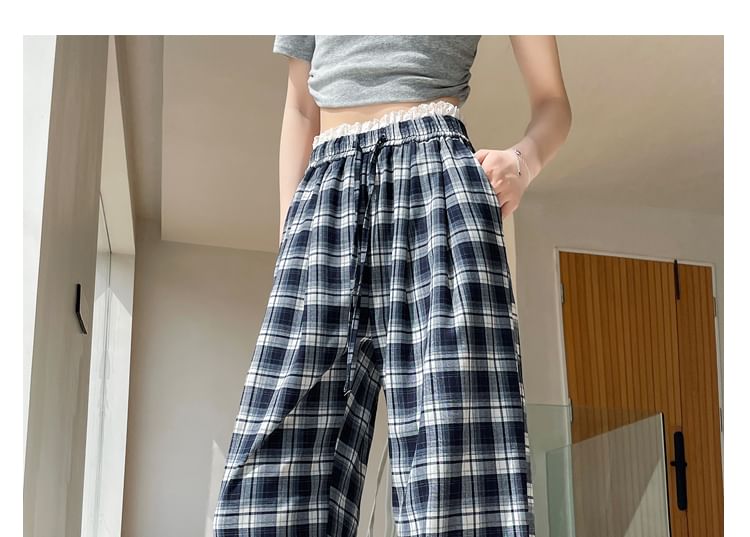 Tel tot 10 - Broek met trekkoord in de taille, geruite kant en wijde pijpen (verschillende ontwerpen)