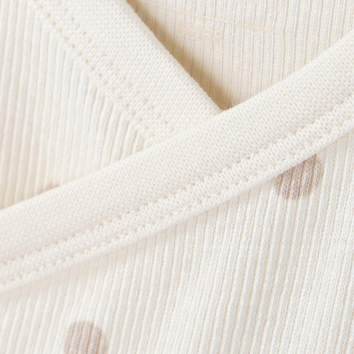 Topomini 2 Newborn Wickelbodys mit Rippstruktur creme / altrosa