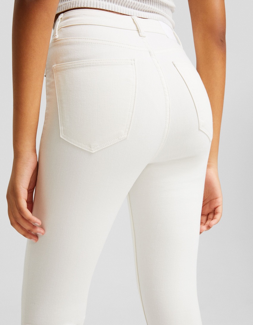 calça jeans skinny de cintura super alta