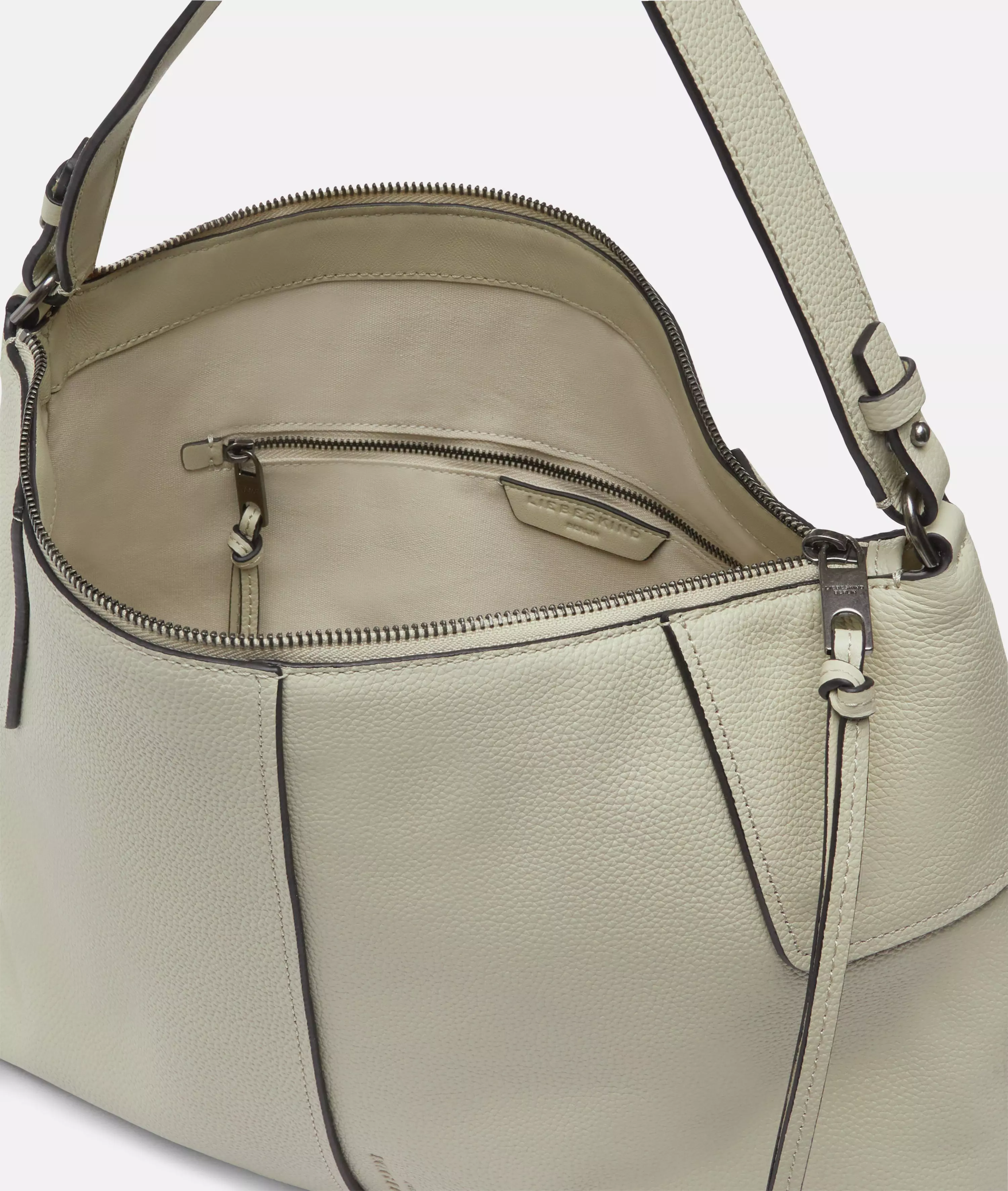 Mila Hobo M Spacious hobo bag made of cowhide leather