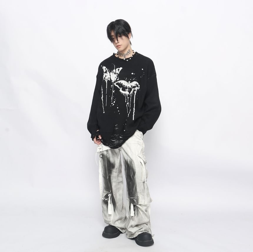 Derbundy - Oversized trui met ronde hals en vlinderprint