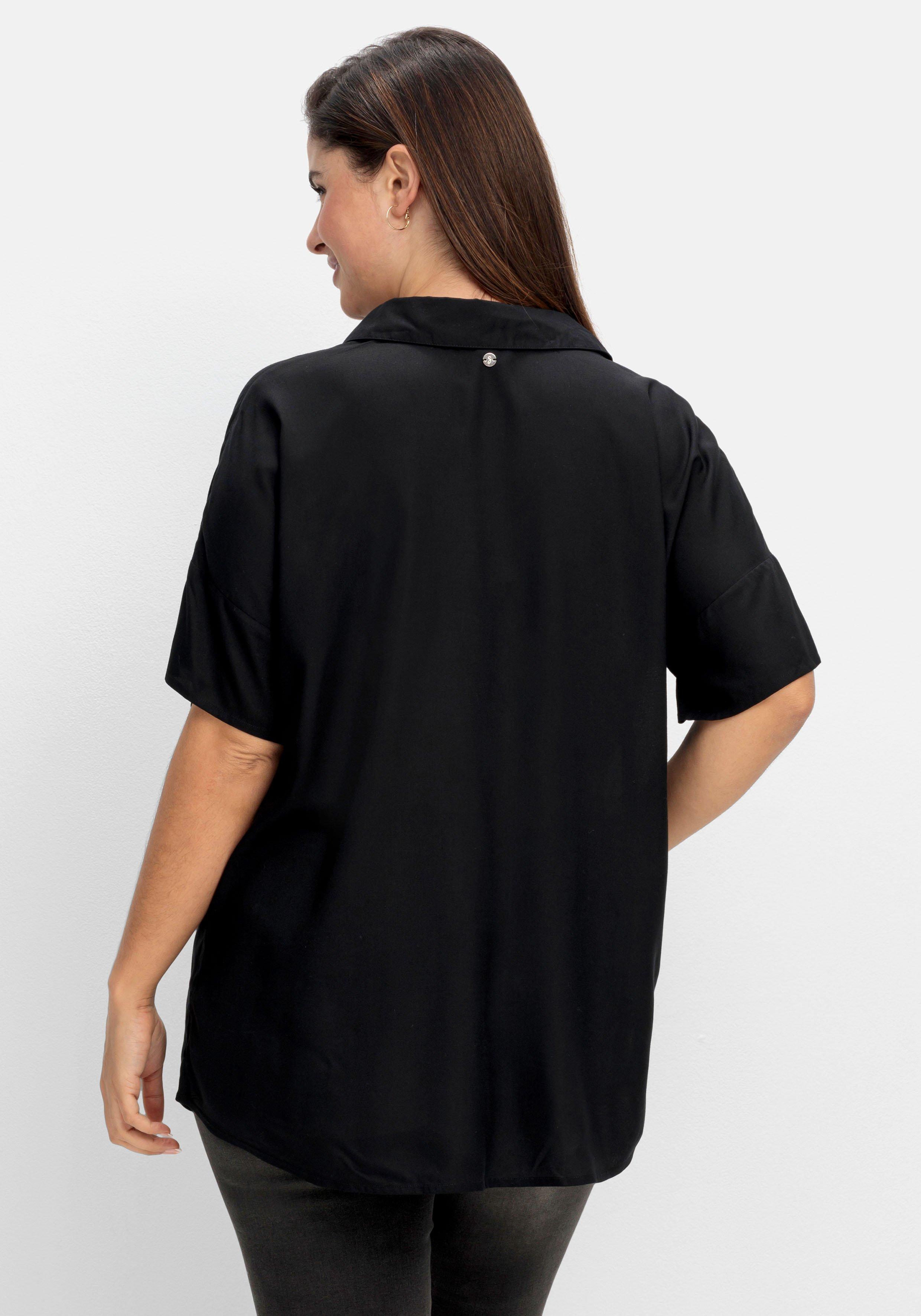 Bluse mit überschnittenen Schultern