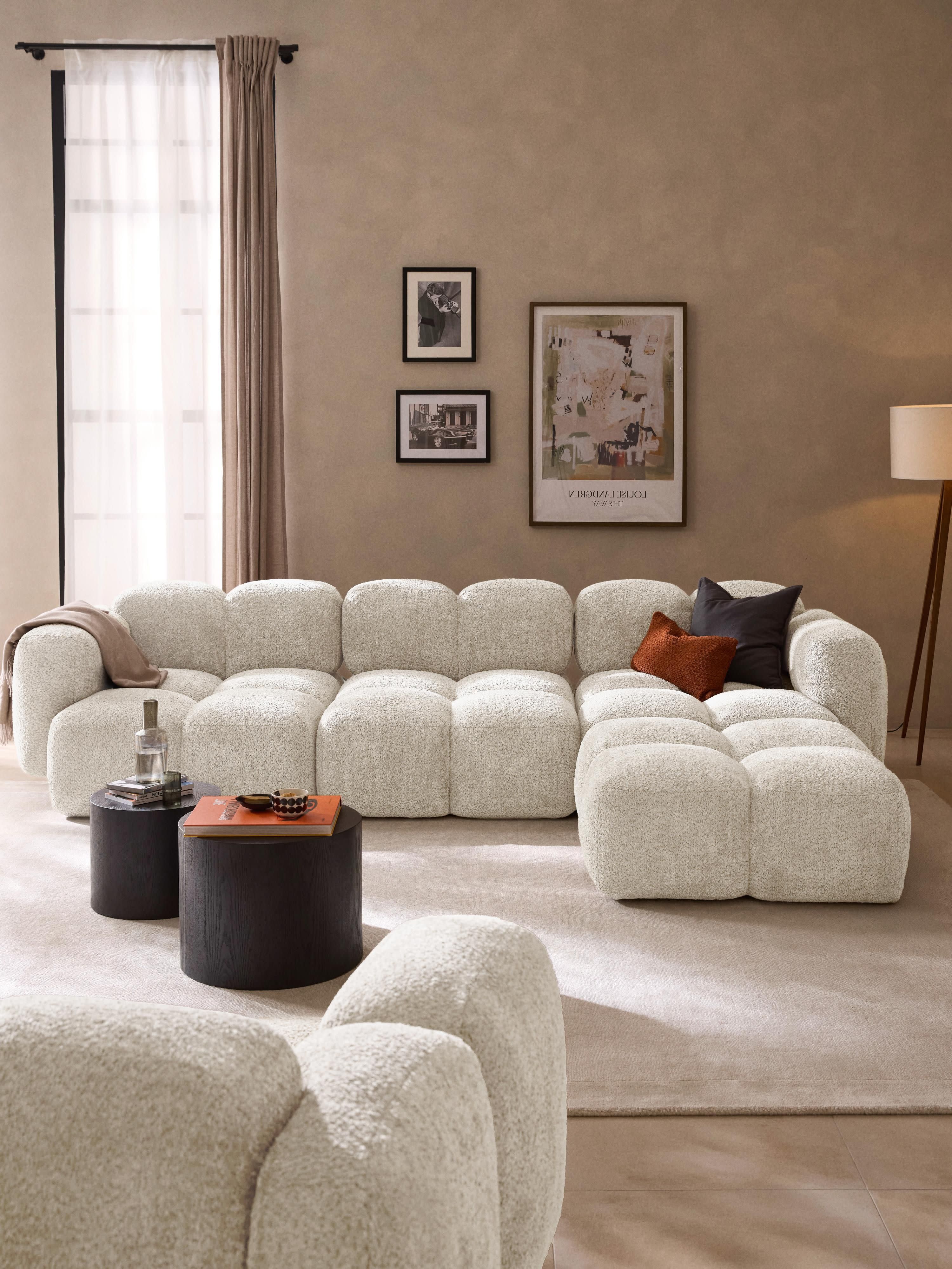 Modulaire bank Tayla (4-zits) van teddy bouclé met poef (links/rechts)