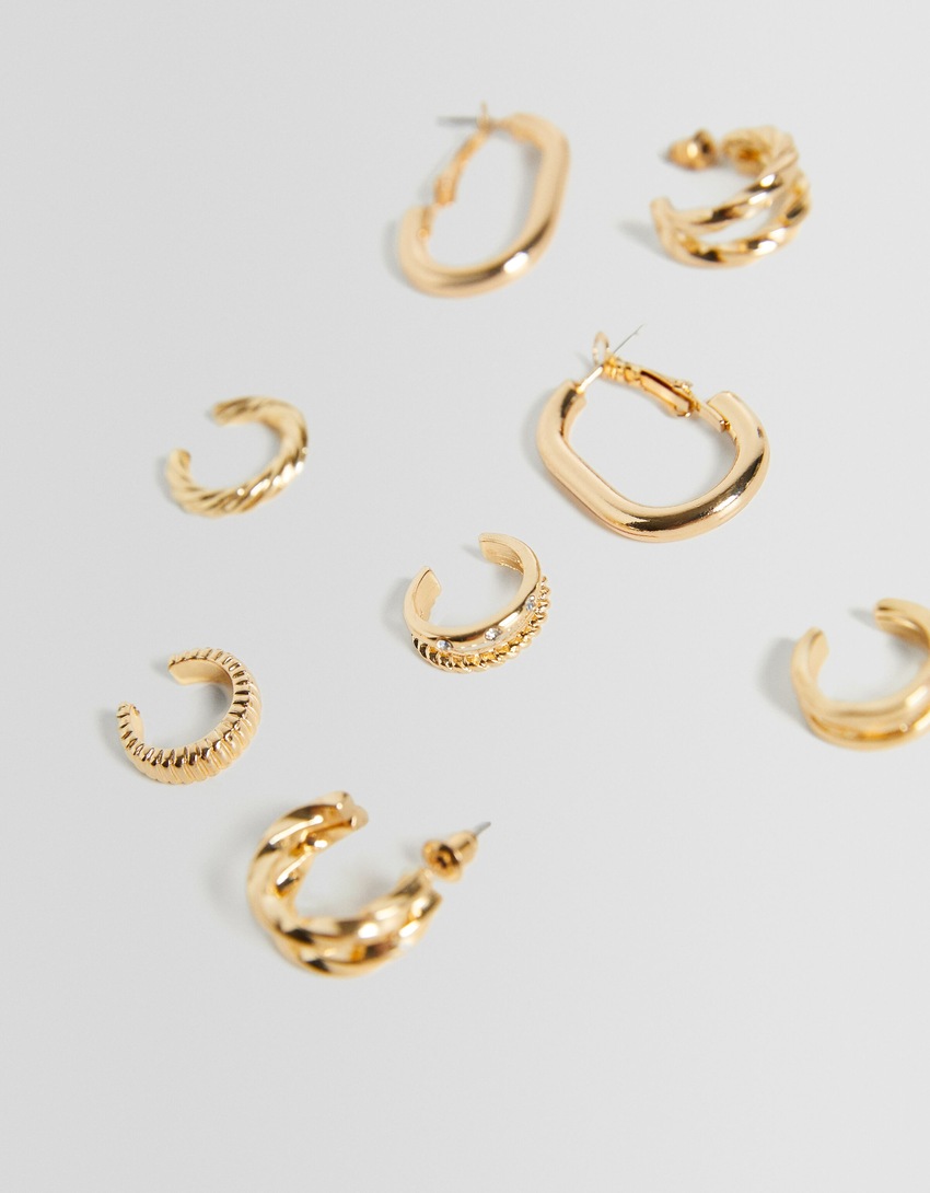Conjunto com 2 brincos de argola e 4 brincos de pressão.