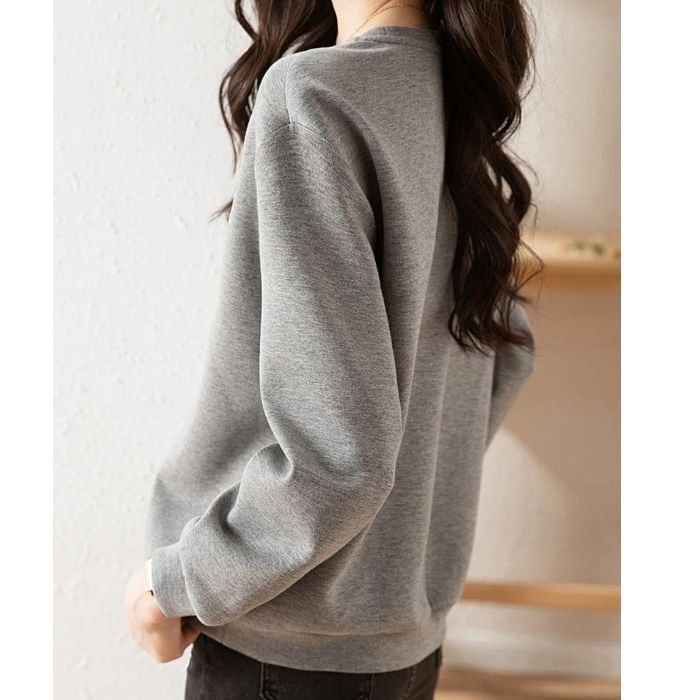 Kwuartz - Sweatshirt met ronde hals en bloemenpailletten