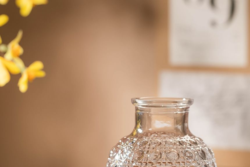 Koringa - Set: Geëmbosseerde glazen fles + drinkbeker