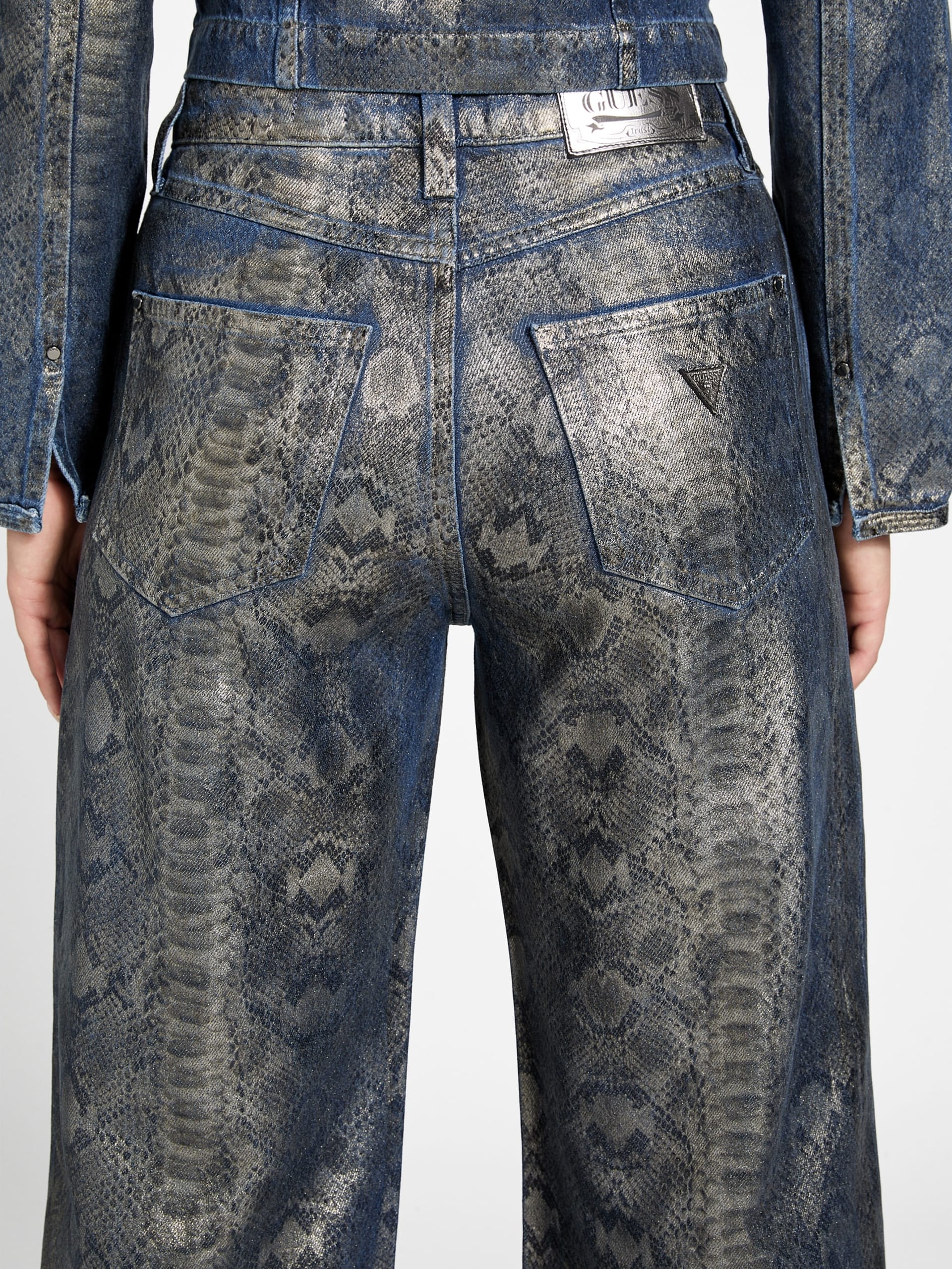 Calça jeans Bellflower com estampa de pele de cobra