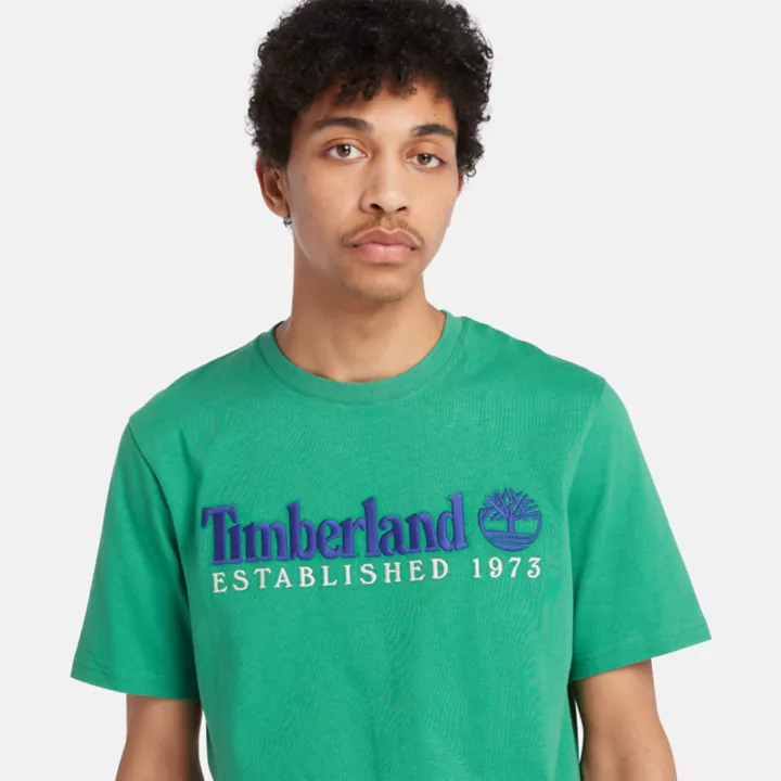 Camiseta masculina verde da equipe Est. 1973.