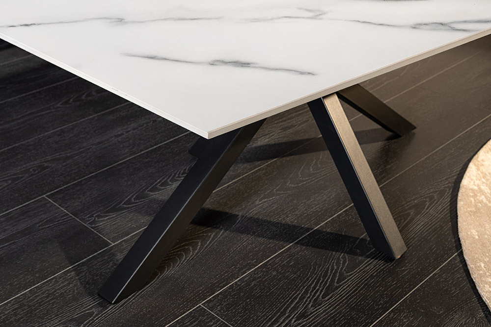 Moderner Couchtisch GALAXIE 100cm weiß Keramik schwarz Metall Sterngestell