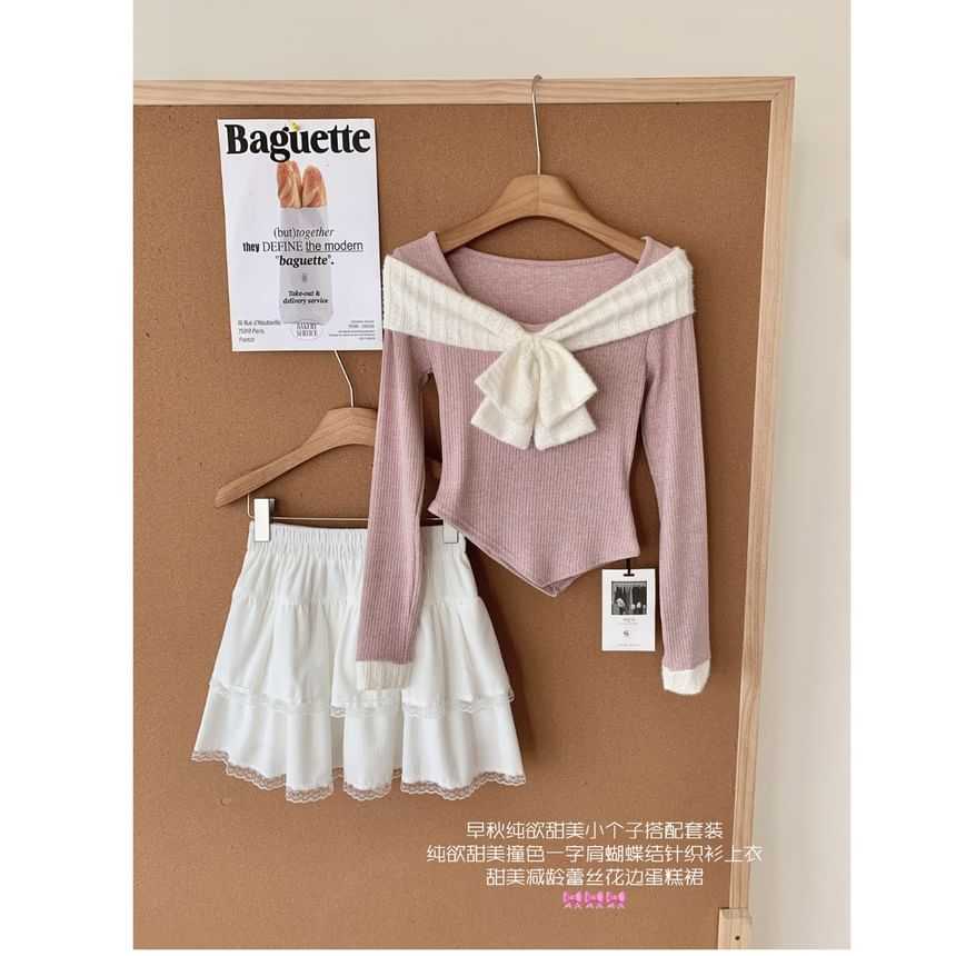 Dute - Set: Asymmetrische top met lange mouwen en vierkante hals + mini-laagrok