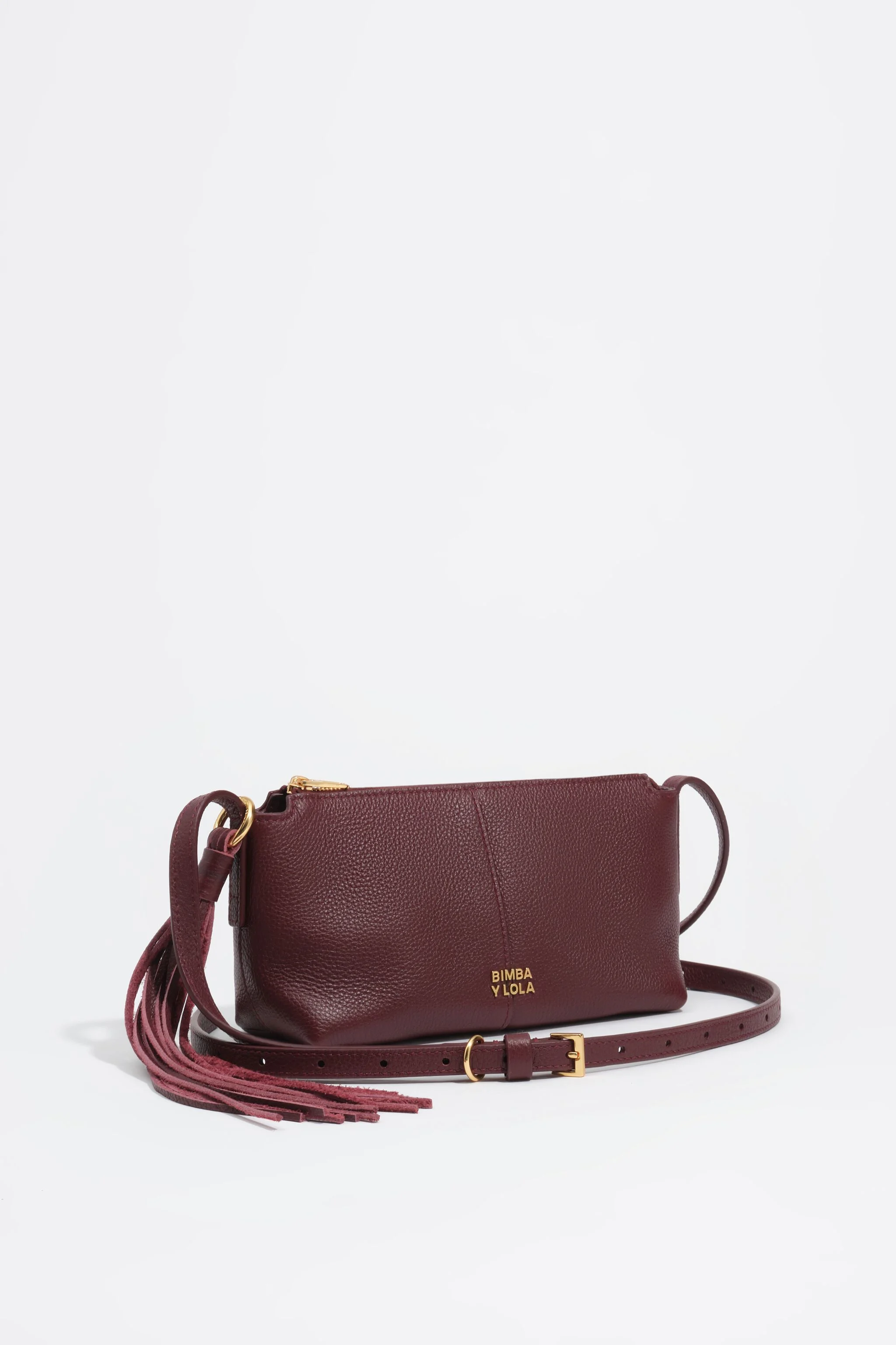 Bolsa transversal pequena em couro bordô