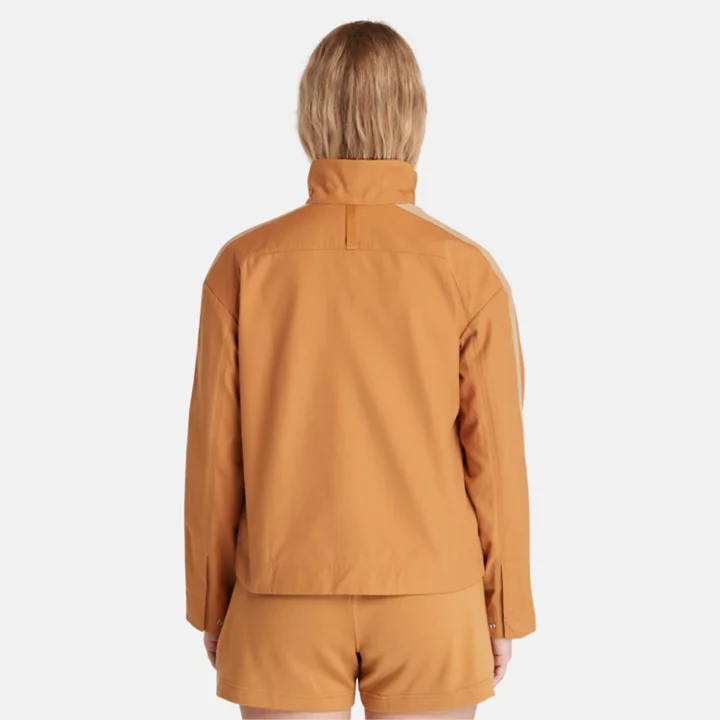 Jaqueta feminina Timberland x Icebreaker em algodão merino amarelo.