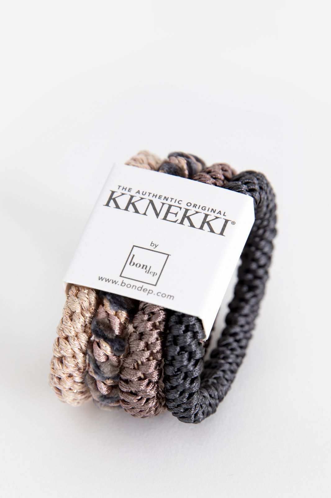 Kknekki beige gevlochten haarelastieken