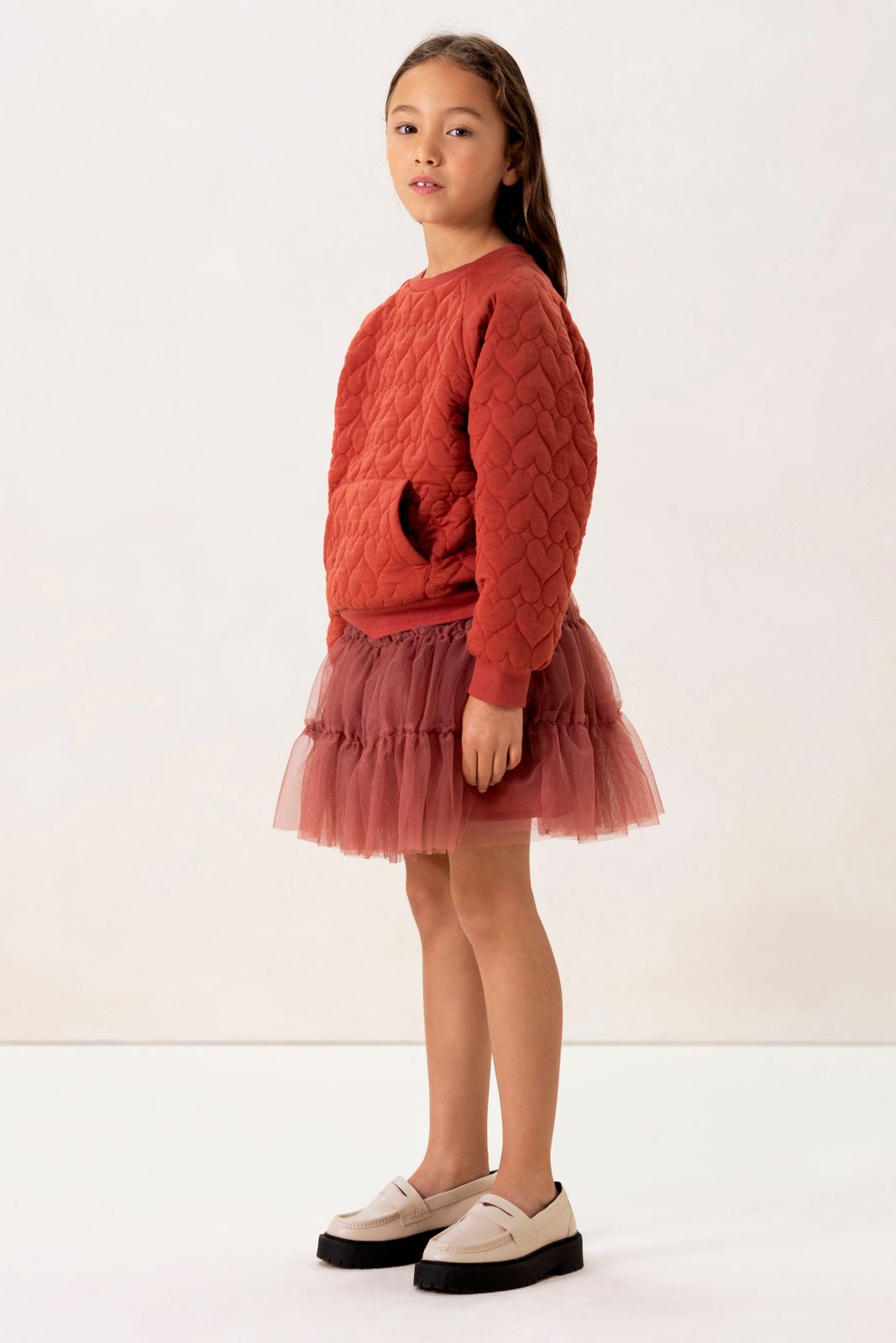 Rode sweater met hartjes quilting