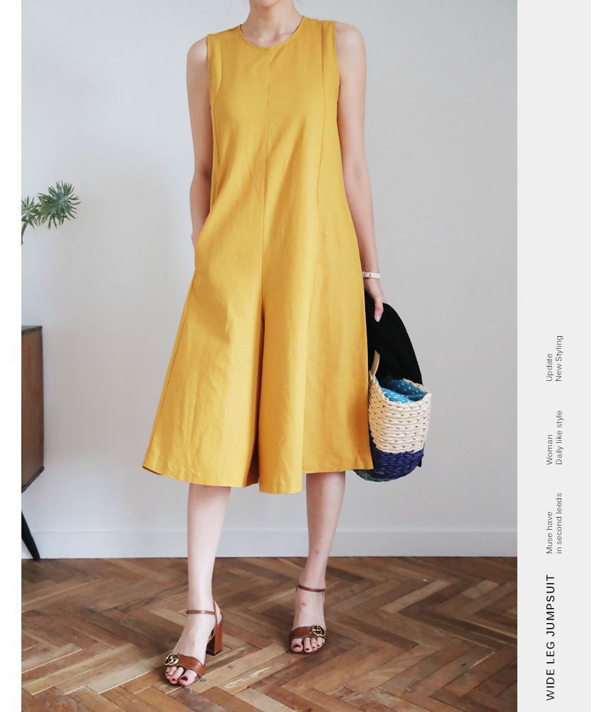 Felixia - Mouwloze ronde hals capri jumpsuit met wijde pijpen
