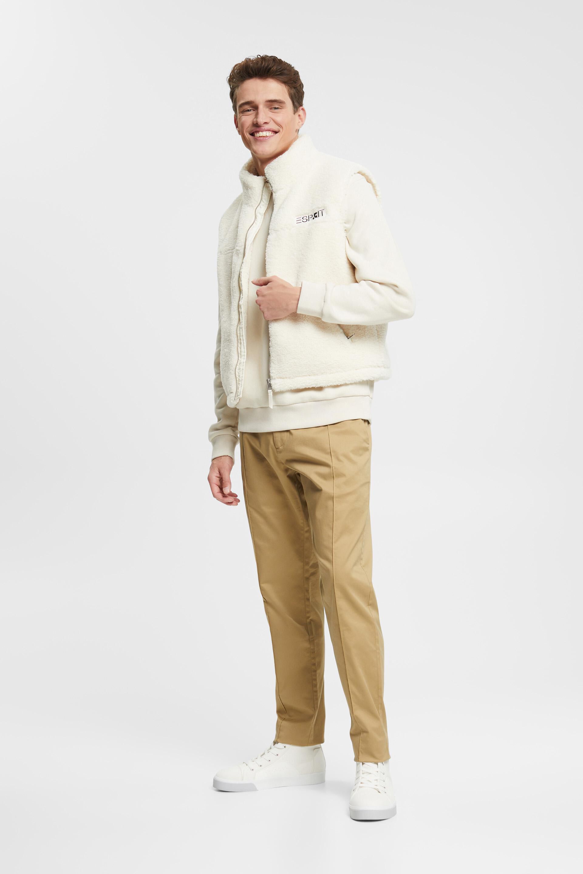 Veste sans manches en borgana d’aspect peluche ornée d’un logo brodé