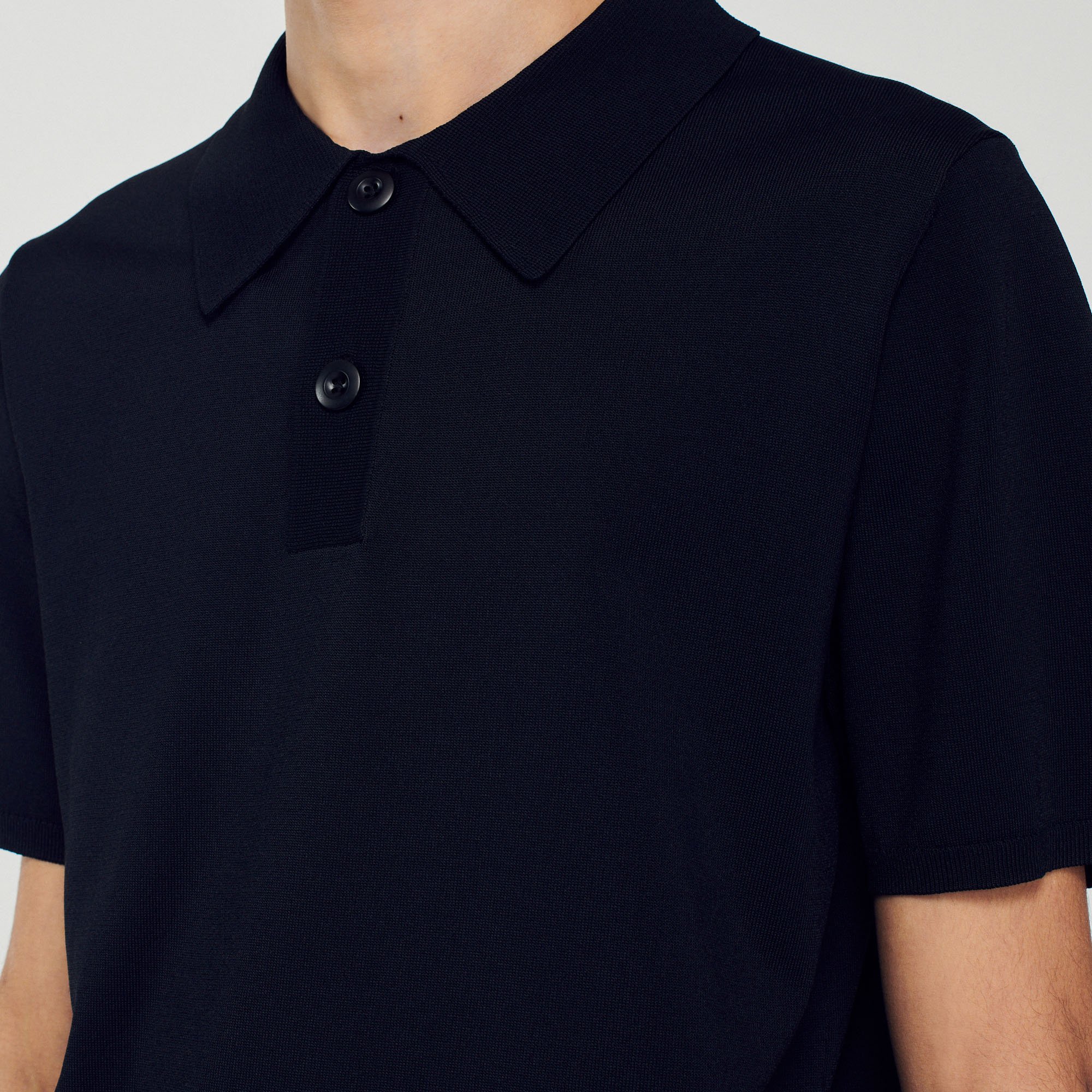 Polo en maille á manches courtes