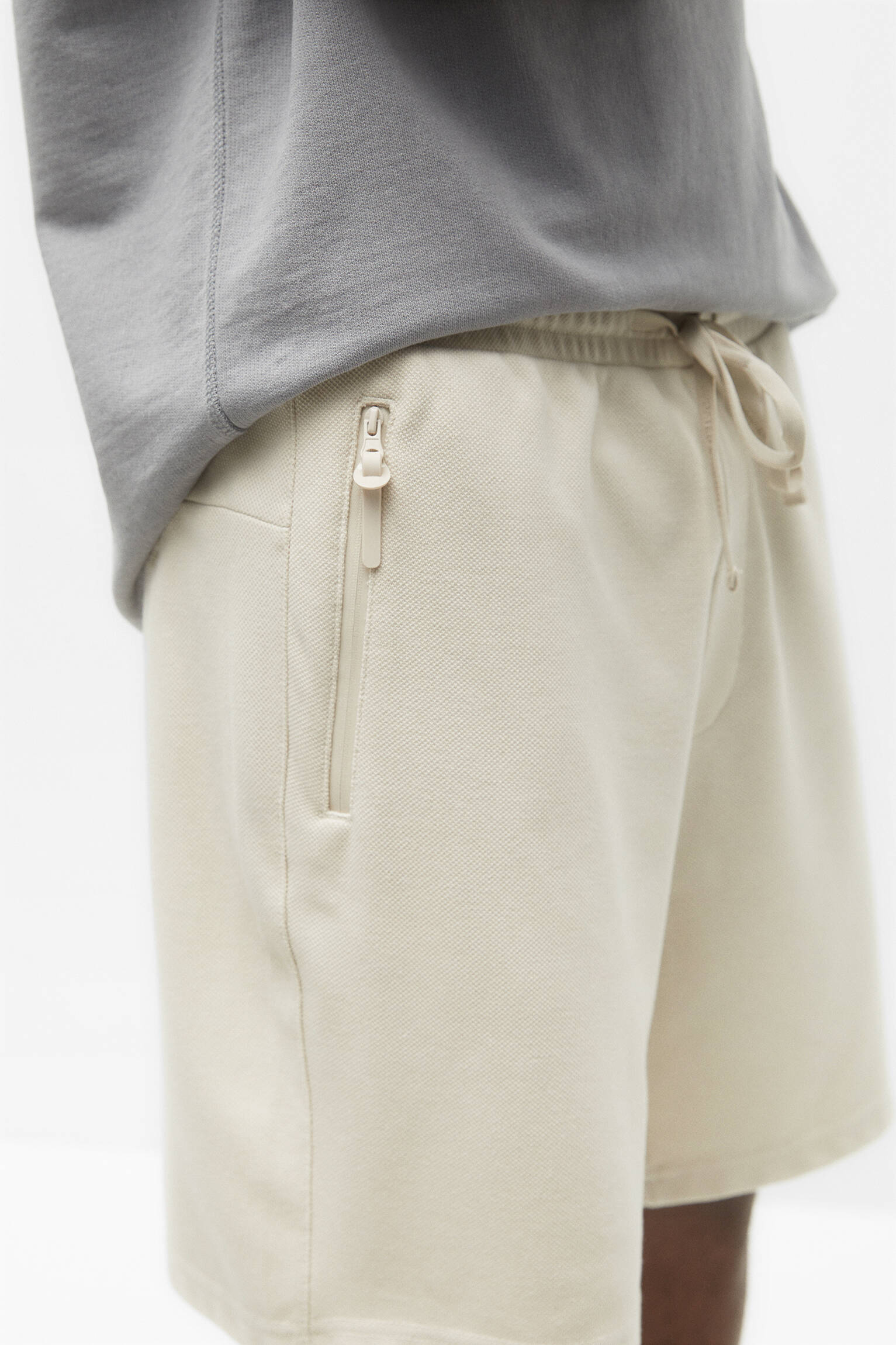 BERMUDA JOGGER CALÇA PIQUÉ - AREIA