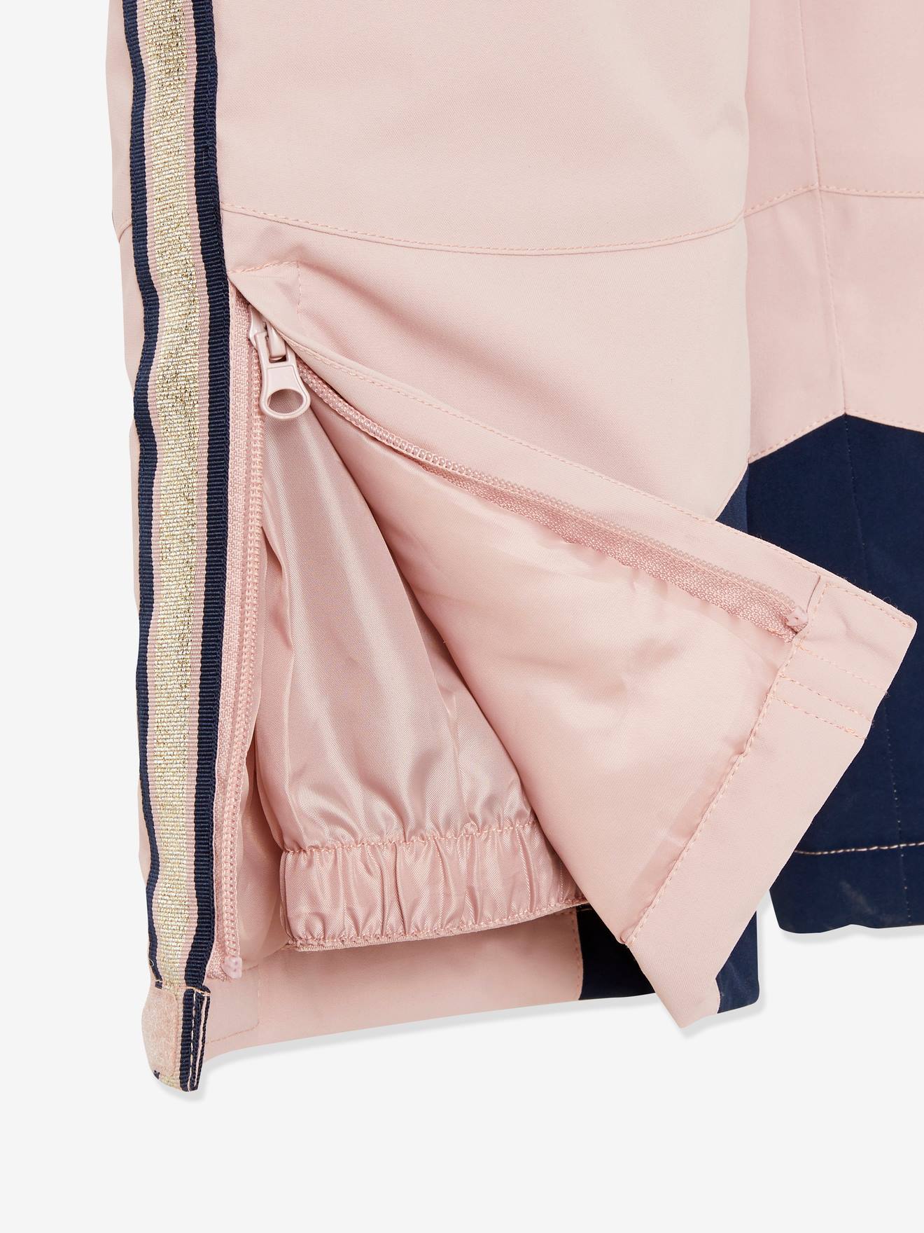 Calças de esqui com detalhes técnicos e iridescentes, e forro liso rosa médio reciclado com estampas.
