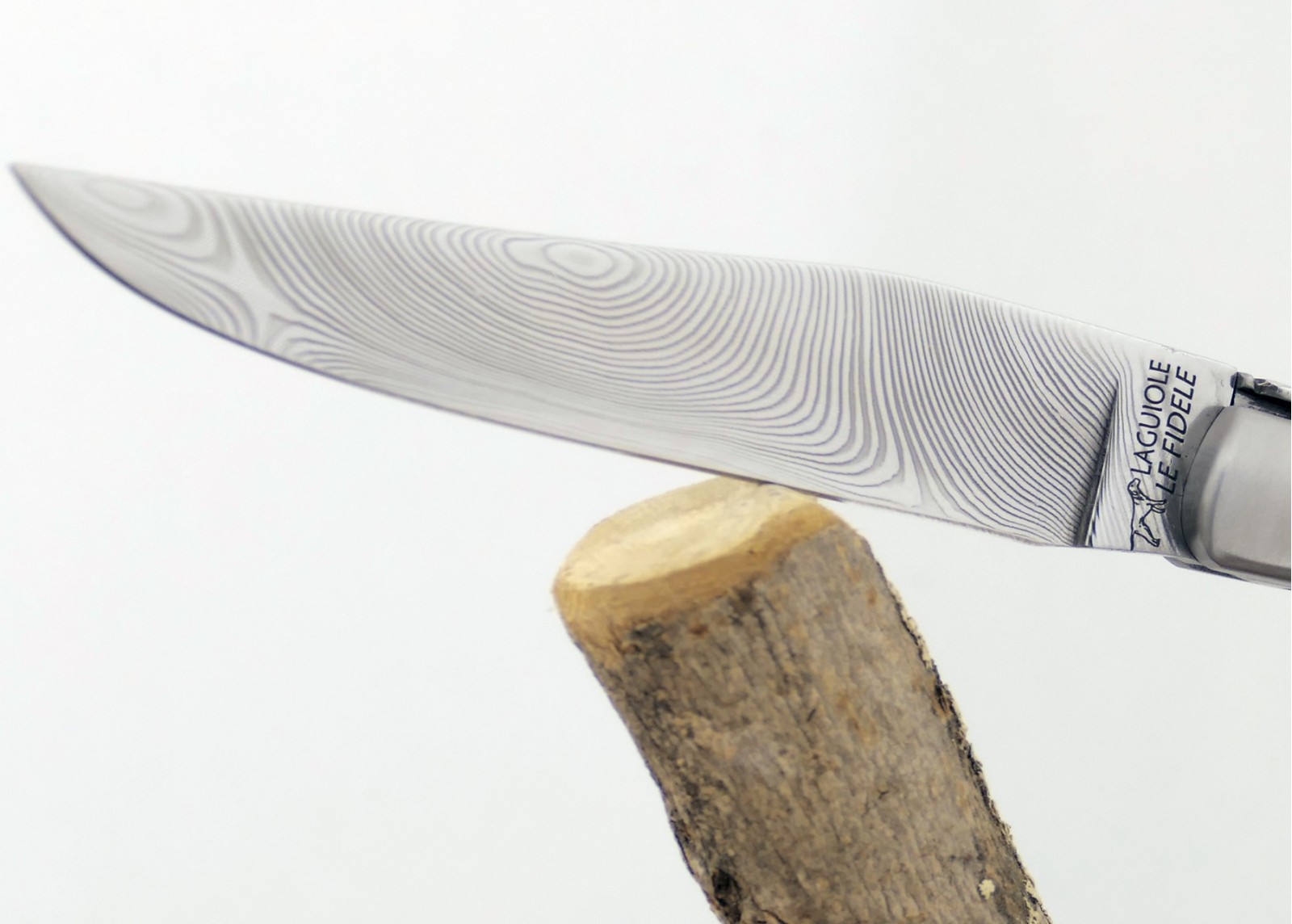Couteau Laguiole avec un manche en Molaire de Mammouth Fossile