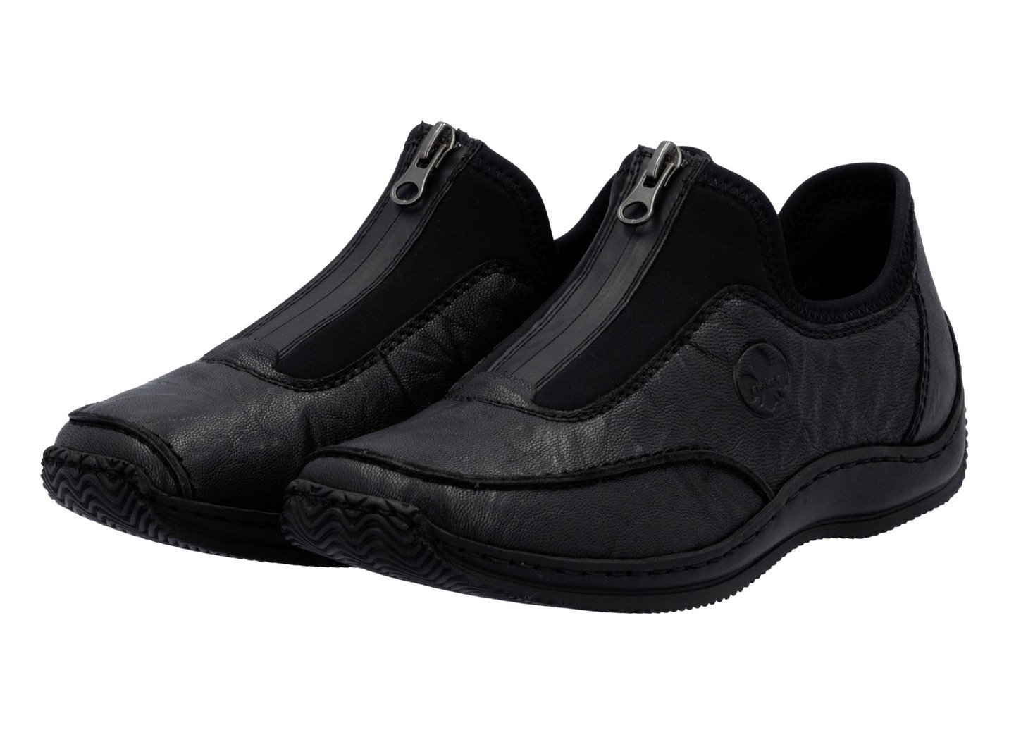 Rieker Slipper aus genarbtem Nappaleder und dehnbarem Textilmaterial