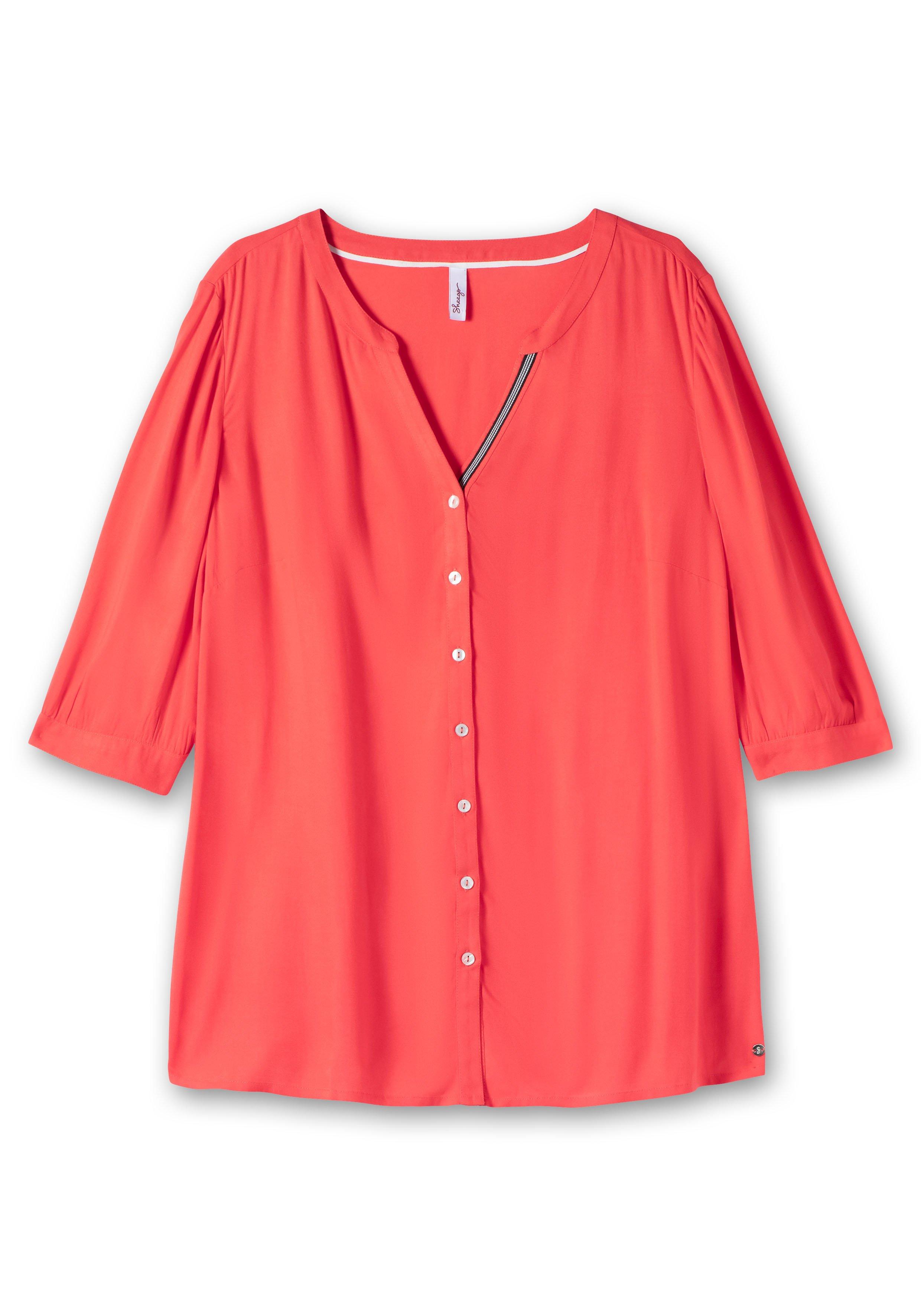 Bluse mit Ziertape am V-Ausschnitt