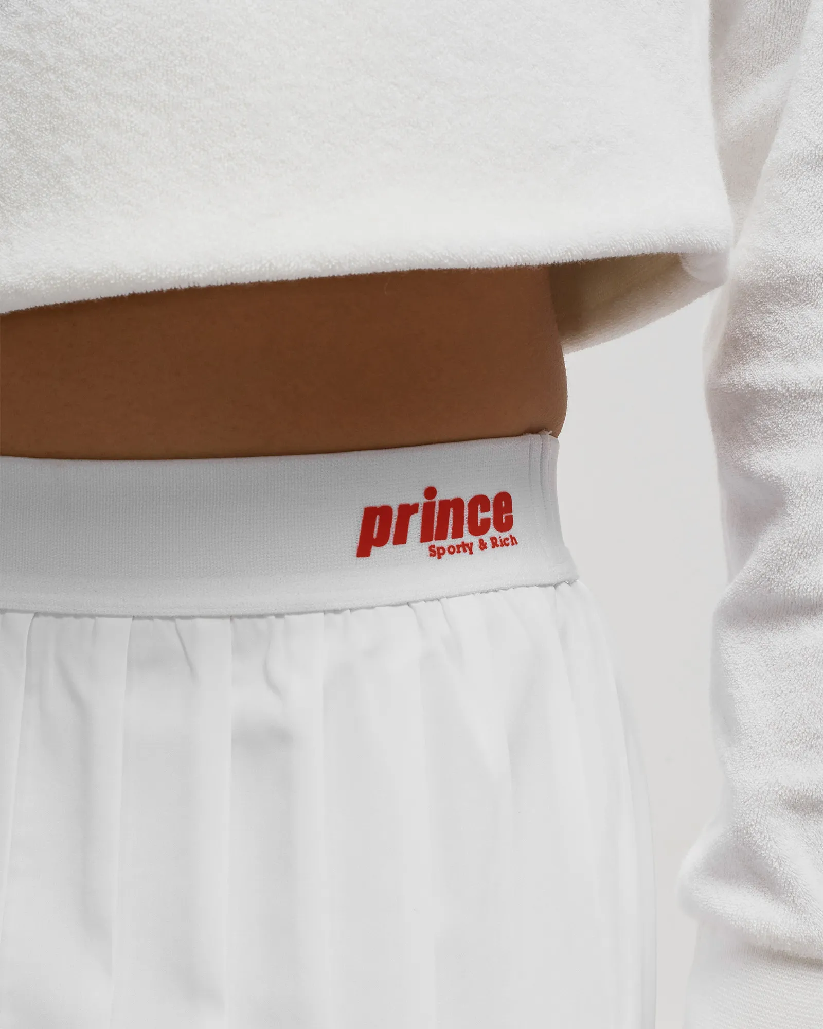 Saia esportiva Prince, elegante e sofisticada